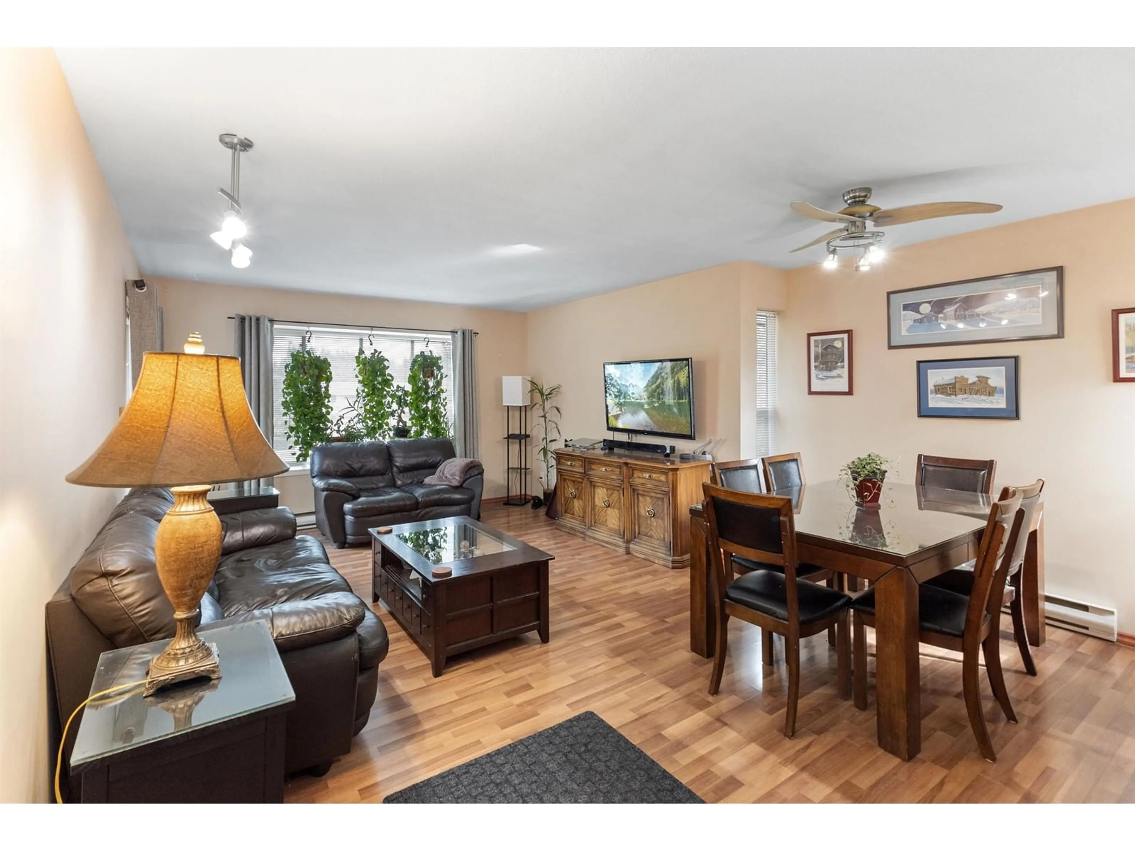 Living room with furniture, wood/laminate floor for 408 - 1750 MCKENZIE, Abbotsford British Columbia V2S3Z3