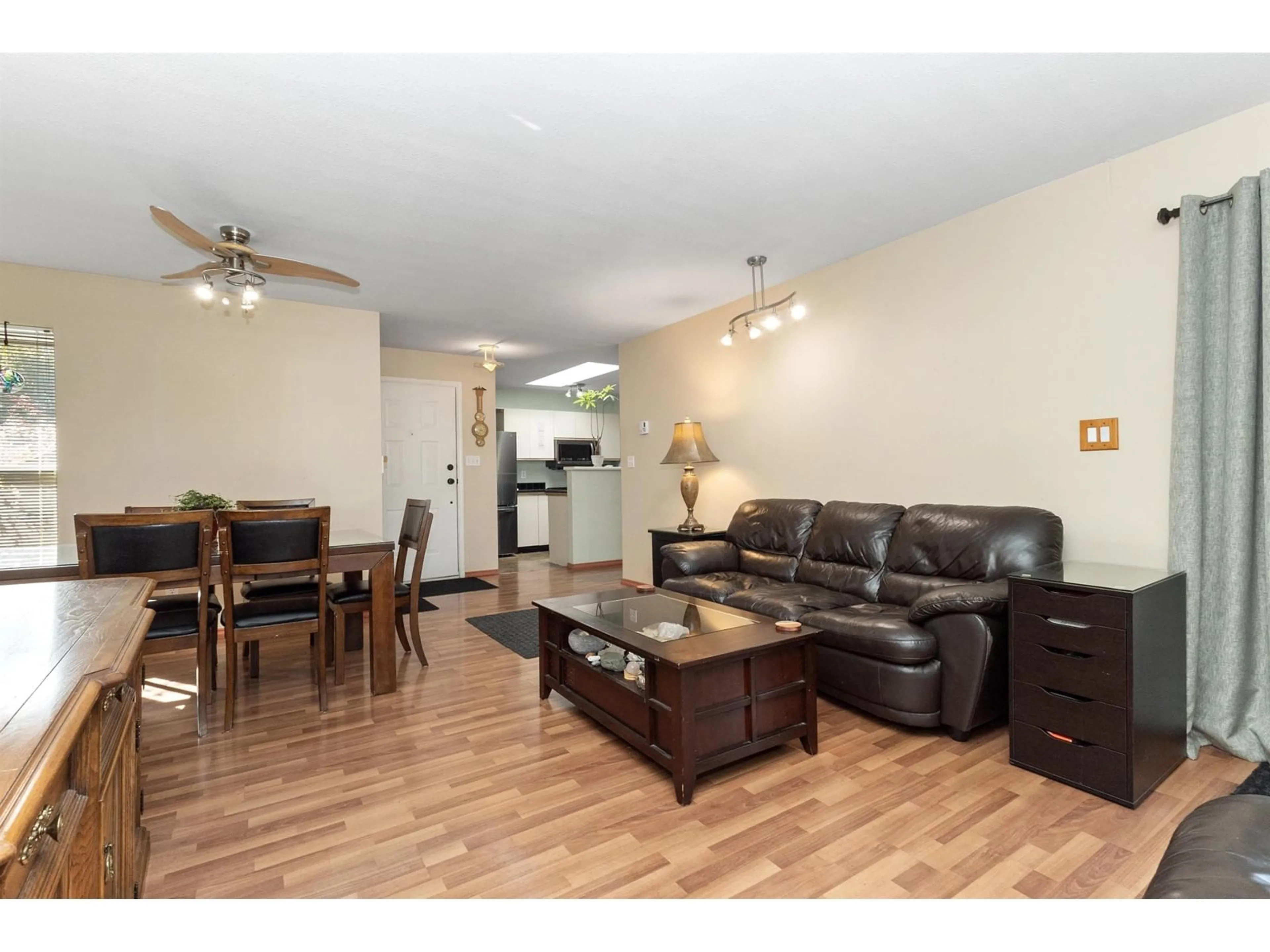 Living room with furniture, wood/laminate floor for 408 - 1750 MCKENZIE, Abbotsford British Columbia V2S3Z3
