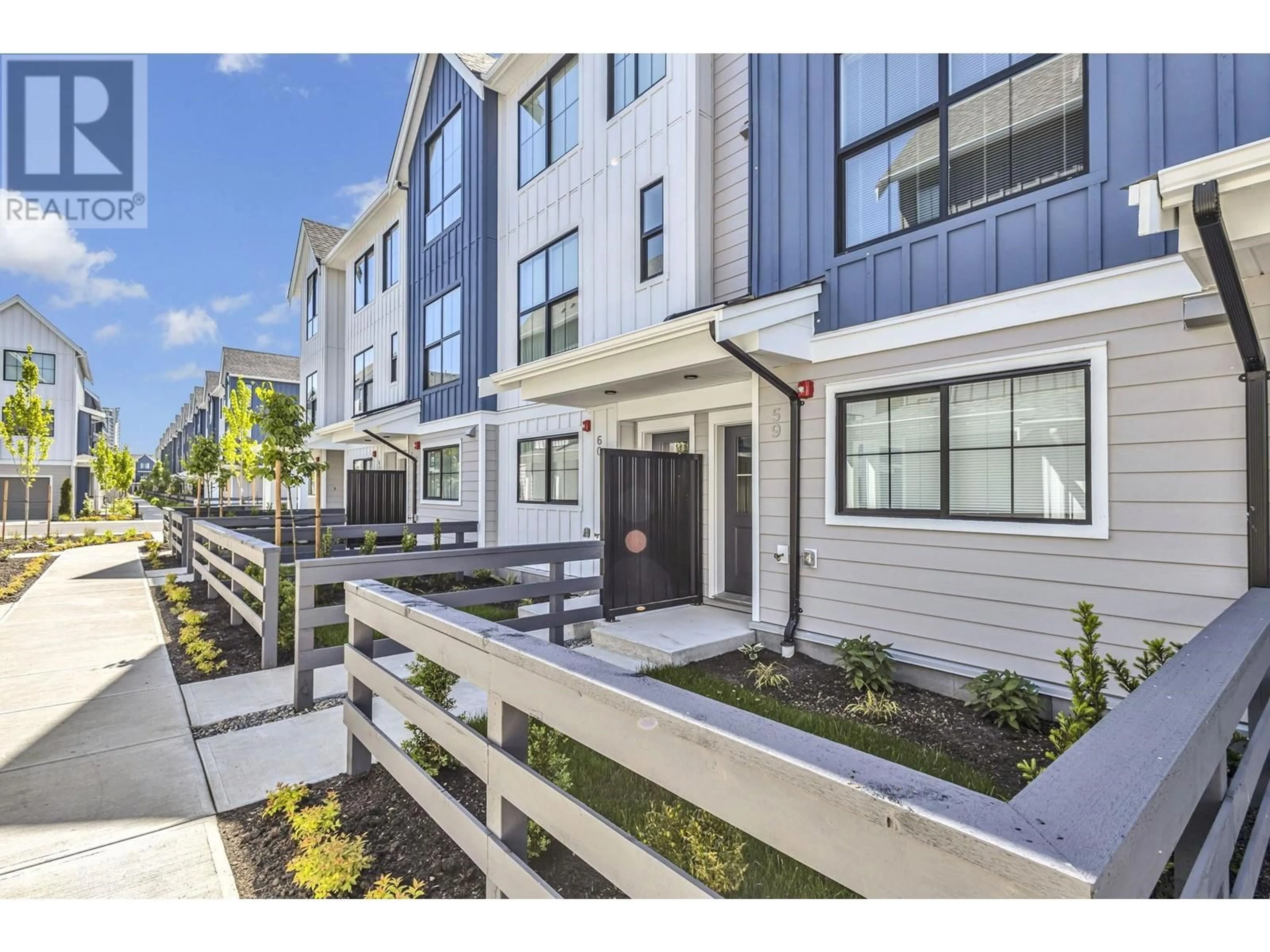 A pic from exterior of the house or condo, the fenced backyard for 59 488 FURNESS STREET, New Westminster British Columbia V3M0M1