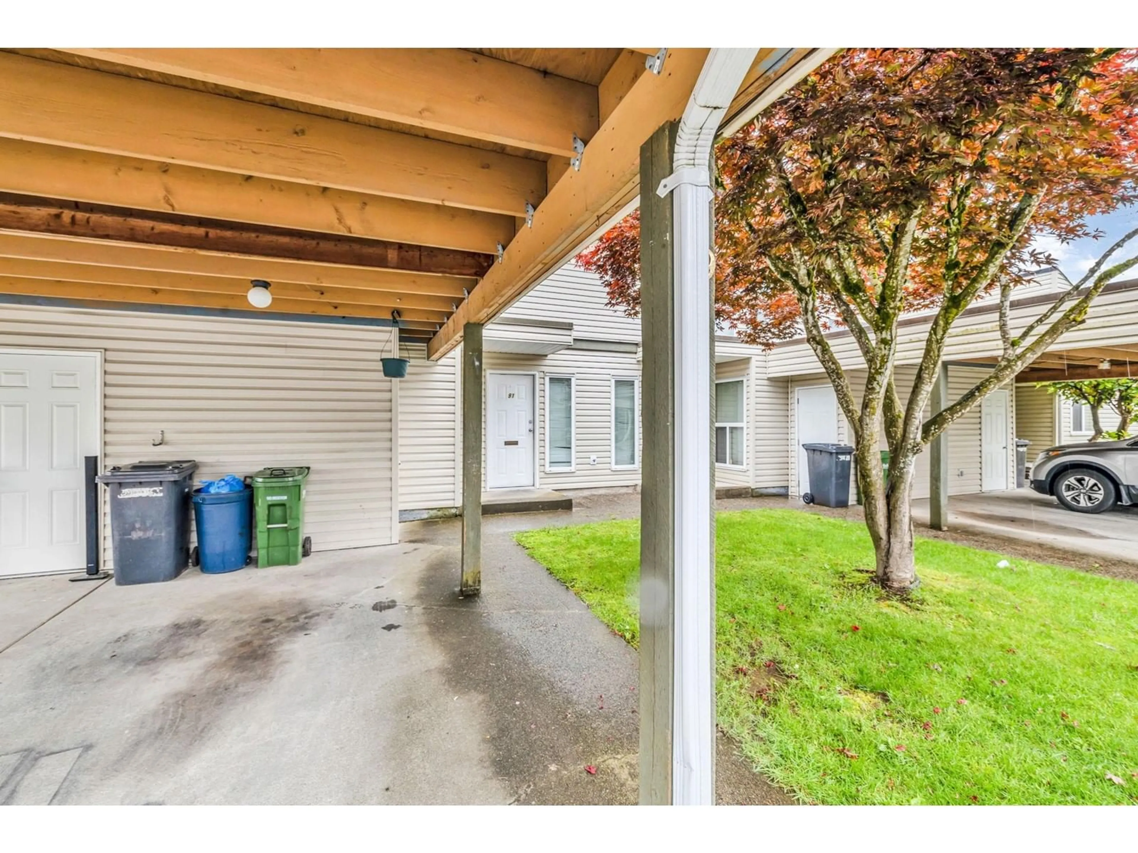 A pic from exterior of the house or condo, the fenced backyard for 91 3030 TRETHEWEY STREET, Abbotsford British Columbia V2T4N2