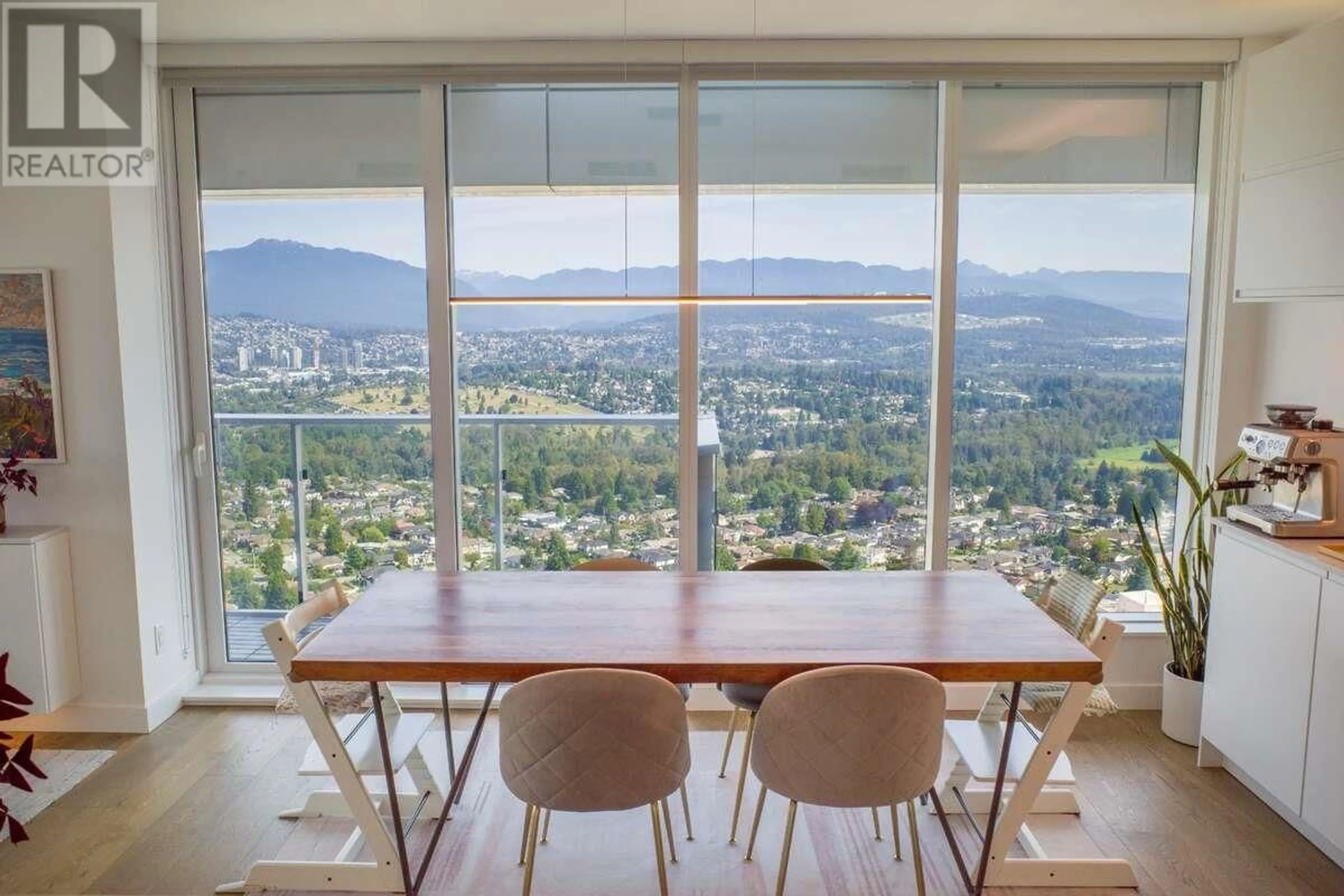 Dining room, wood floors, the view of mountain for 3607 6000 MCKAY AVENUE, Burnaby British Columbia V5H0K2