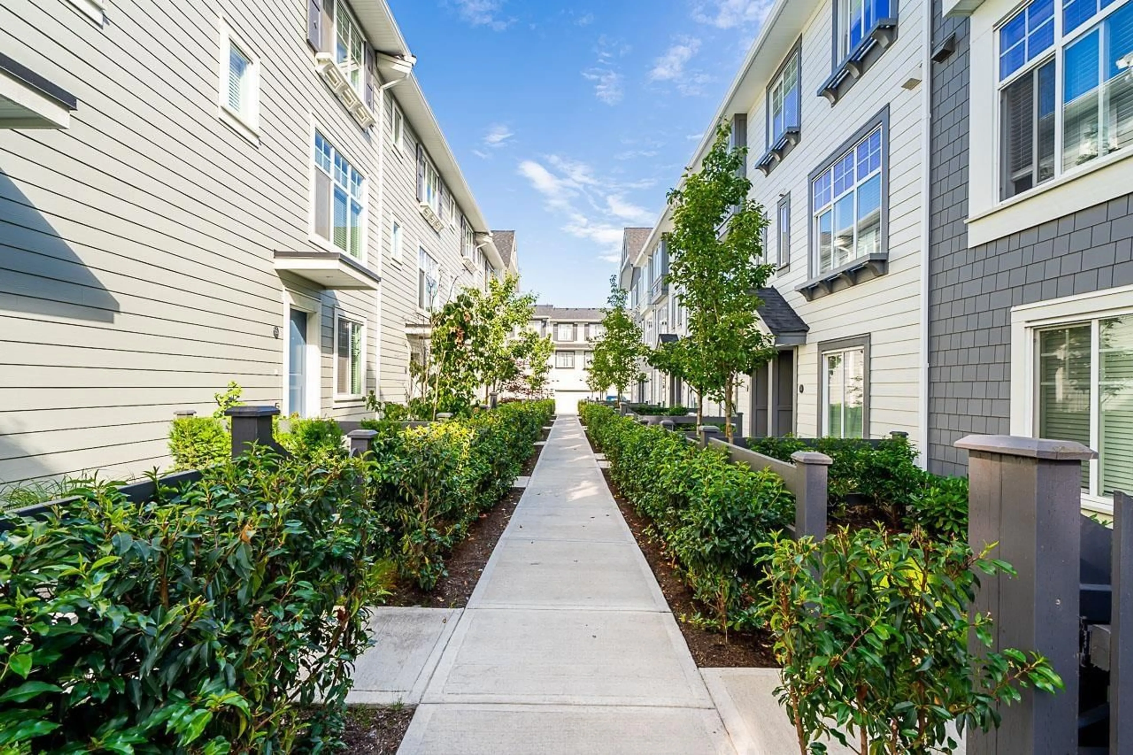 A pic from exterior of the house or condo, the fenced backyard for 25 15778 85 AVENUE, Surrey British Columbia V4N6W8