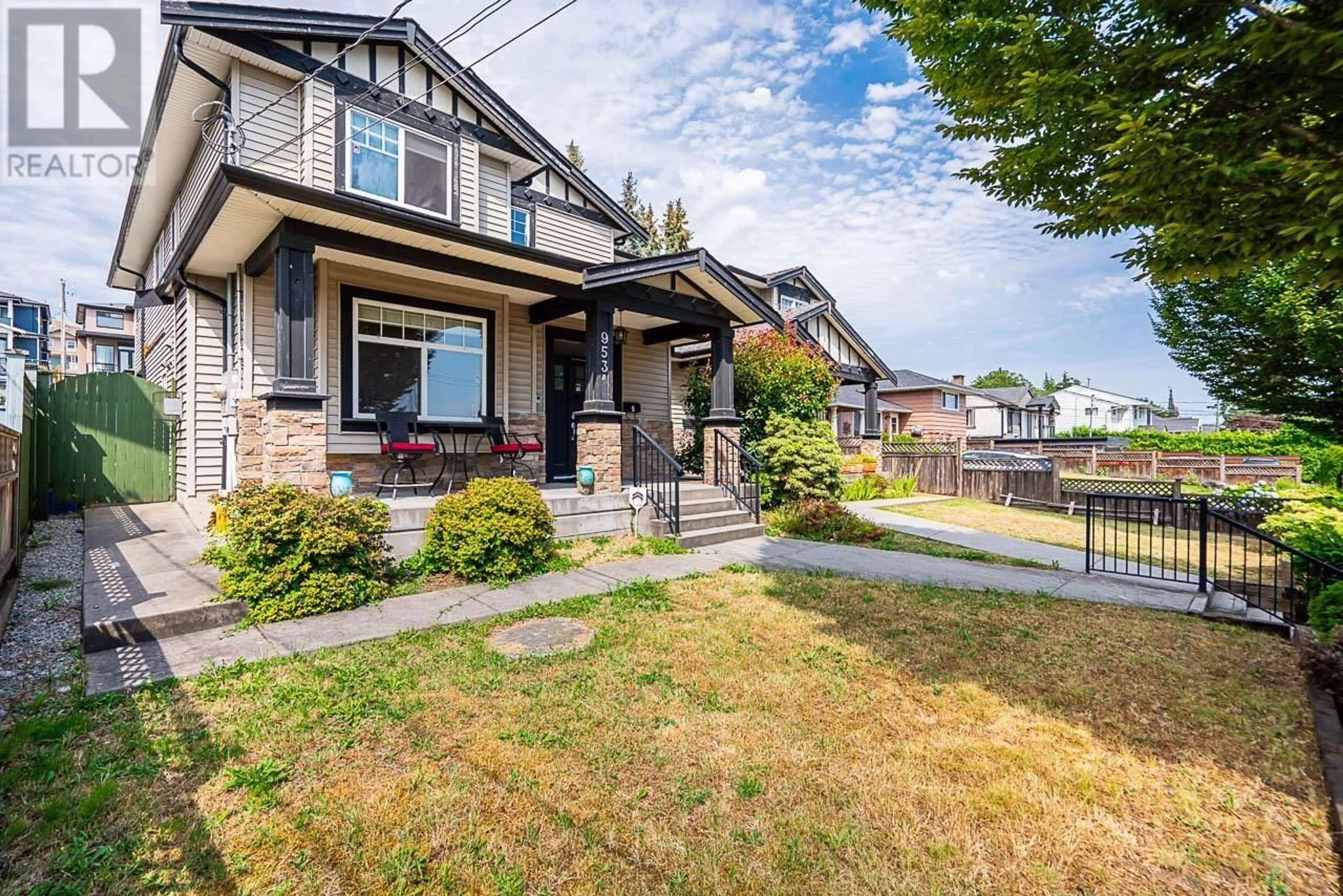 Frontside or backside of a home, the fenced backyard for 953A ALDERSON AVENUE, Coquitlam British Columbia V3K1V7