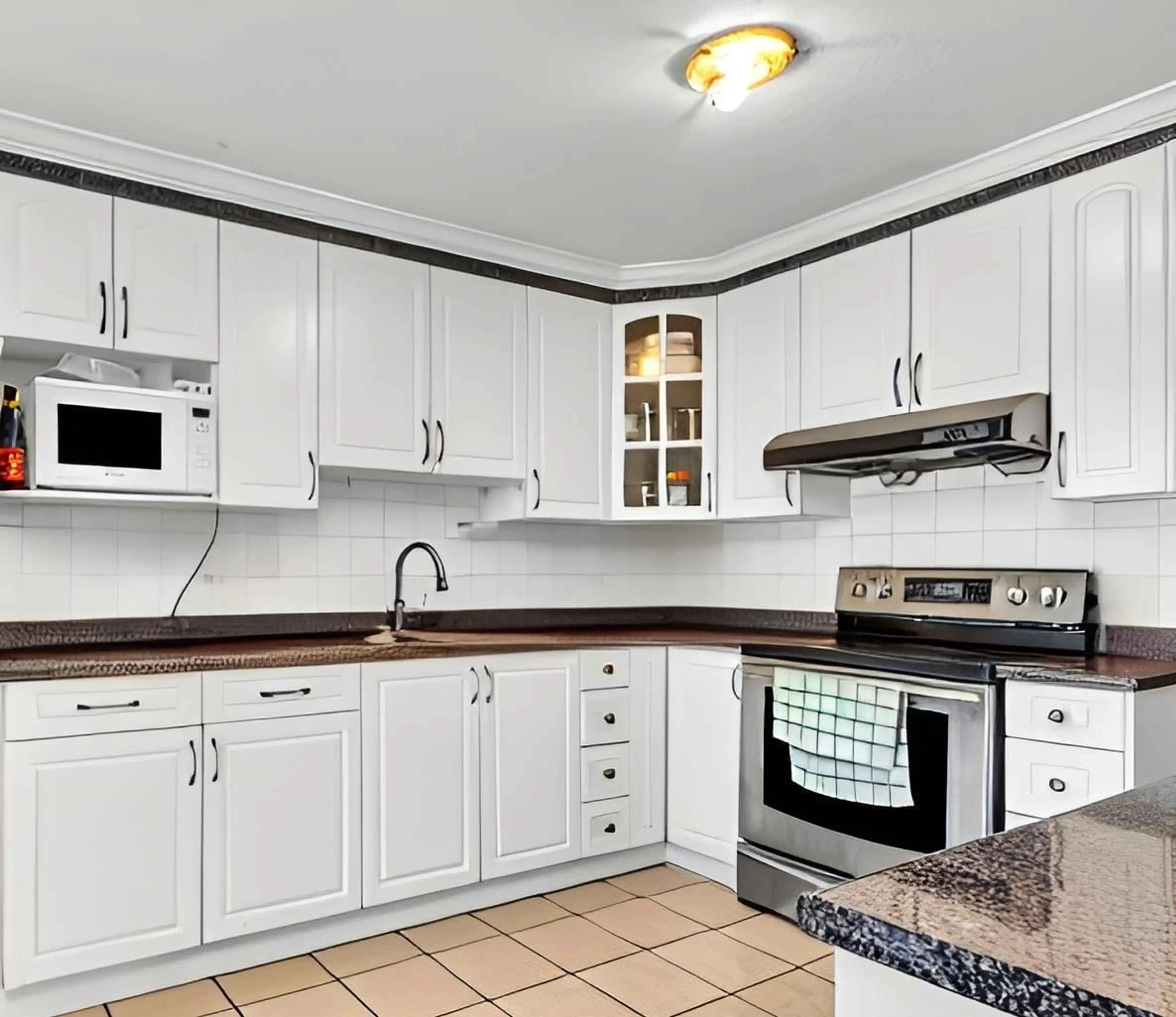 Standard kitchen, wood floors, cottage for 14266 72 AVENUE, Surrey British Columbia V3W2R1