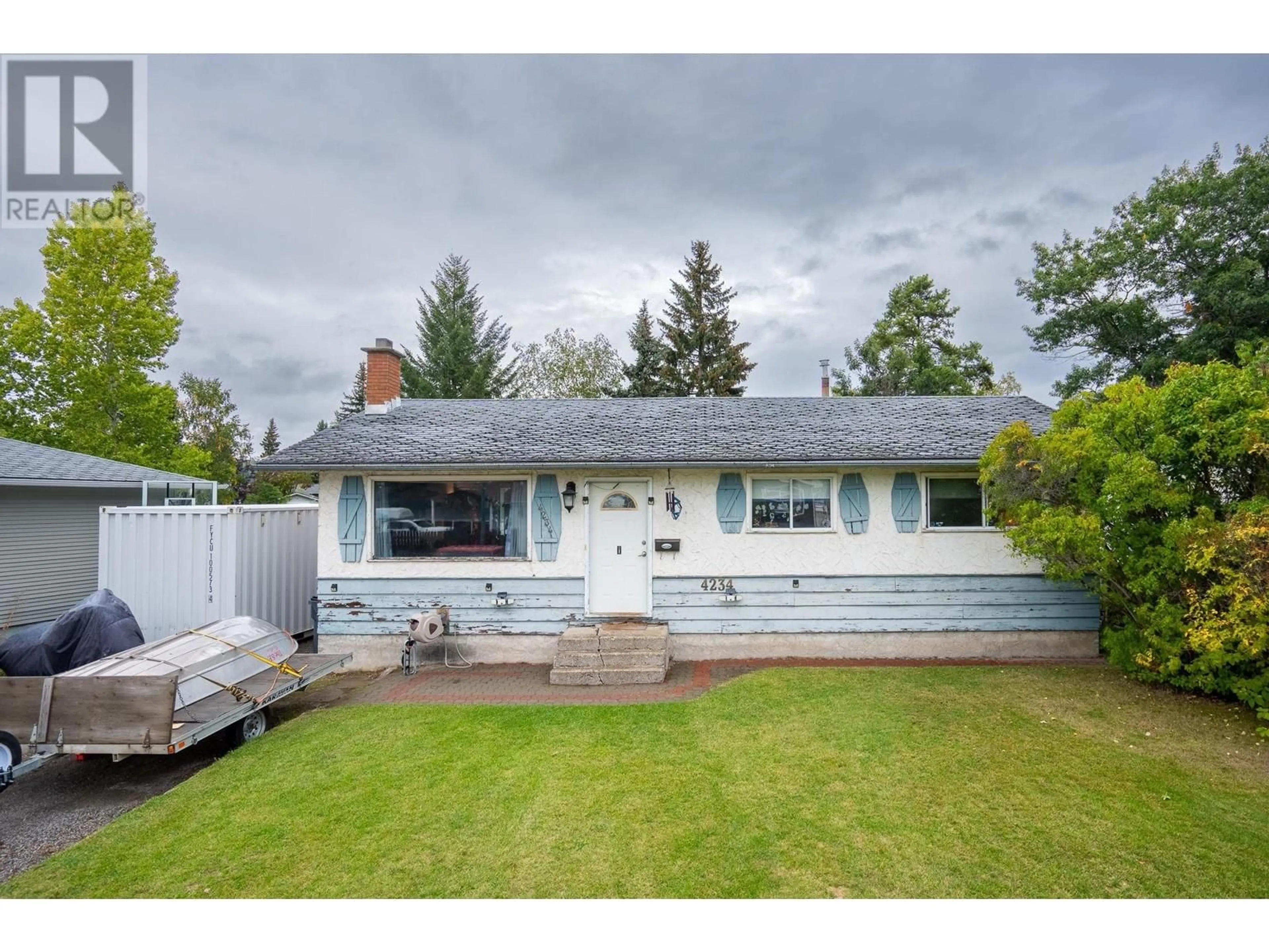 Frontside or backside of a home, the fenced backyard for 4234 DAVIE AVENUE, Prince George British Columbia V2M4G7