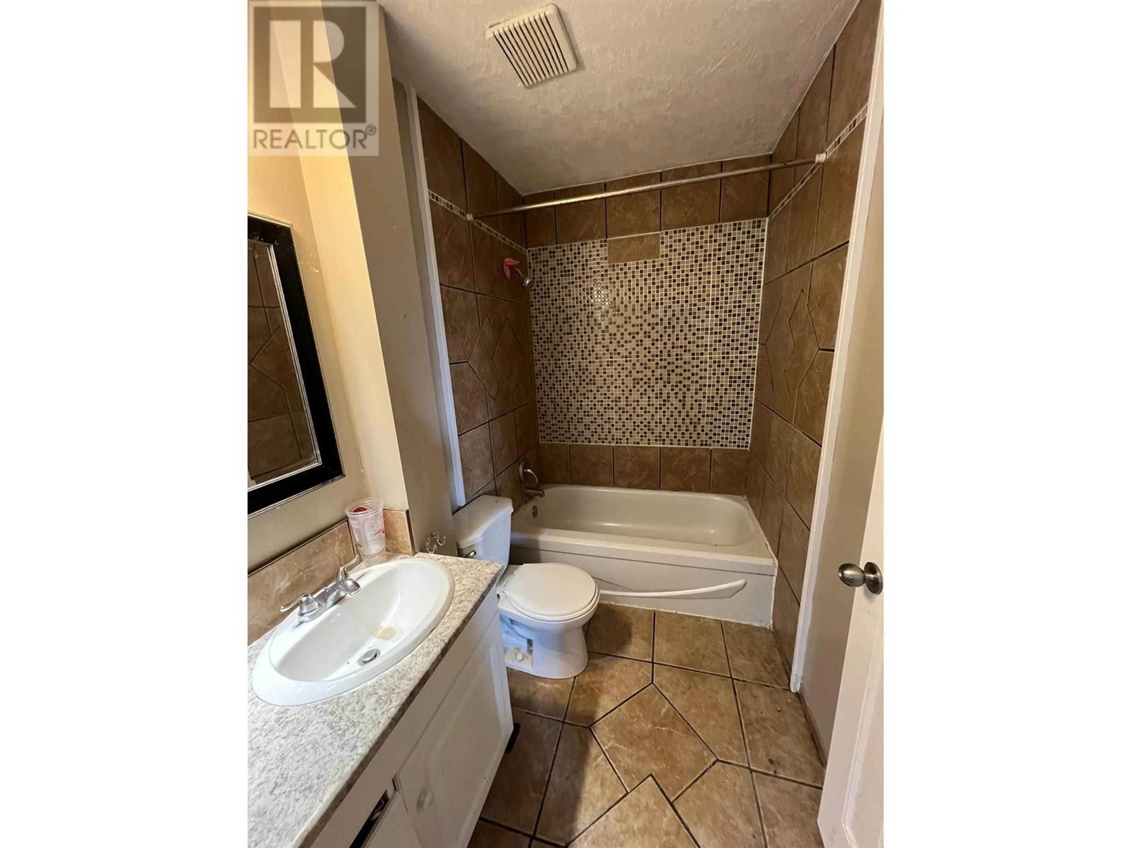 Bathroom, ceramic floors for 9724 102 AVENUE, Fort St. John British Columbia V1J2C8