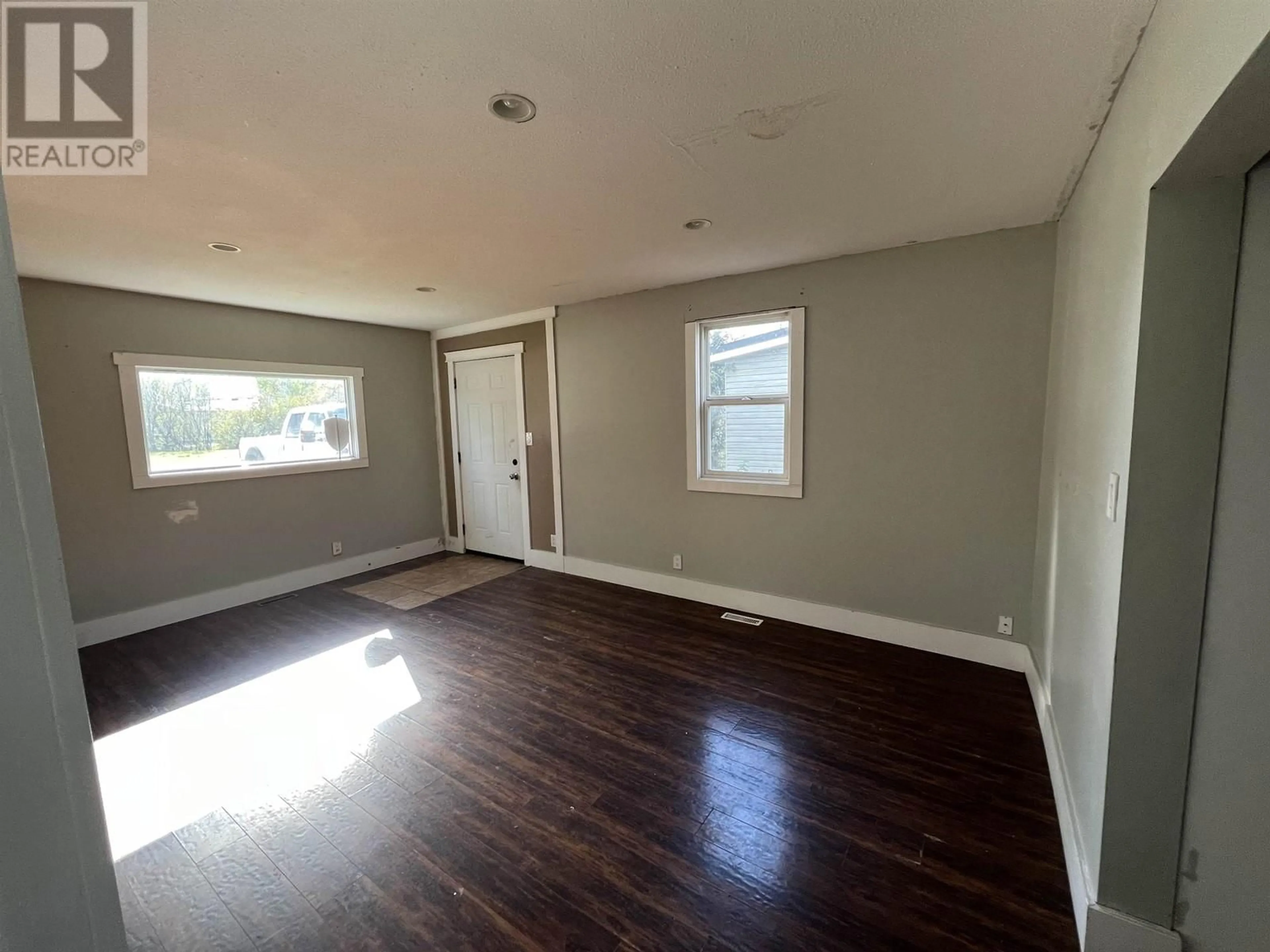 A pic of a room, wood floors for 9724 102 AVENUE, Fort St. John British Columbia V1J2C8