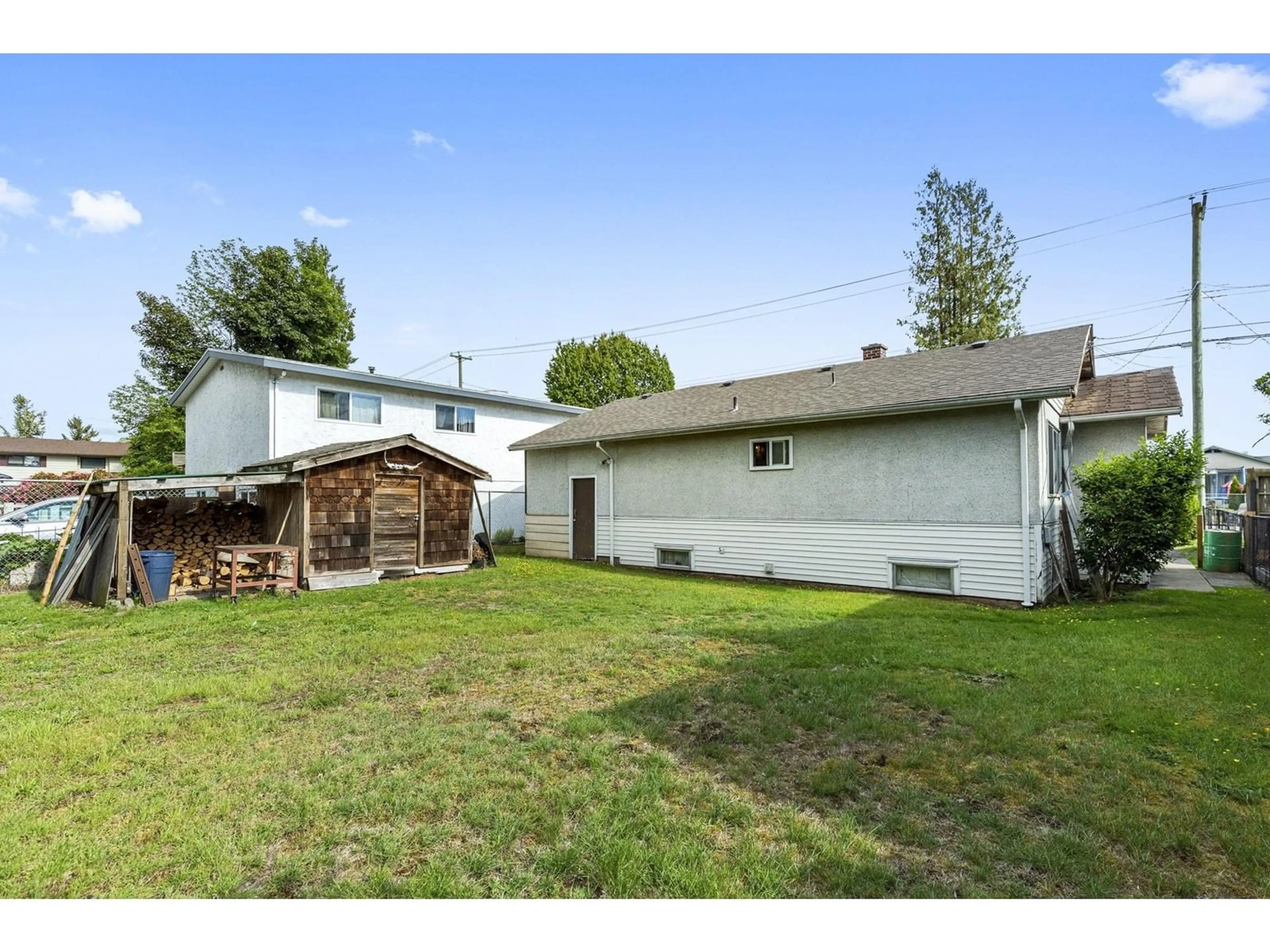 Frontside or backside of a home, the fenced backyard for 33555 7 AVENUE, Mission British Columbia V2V2E8