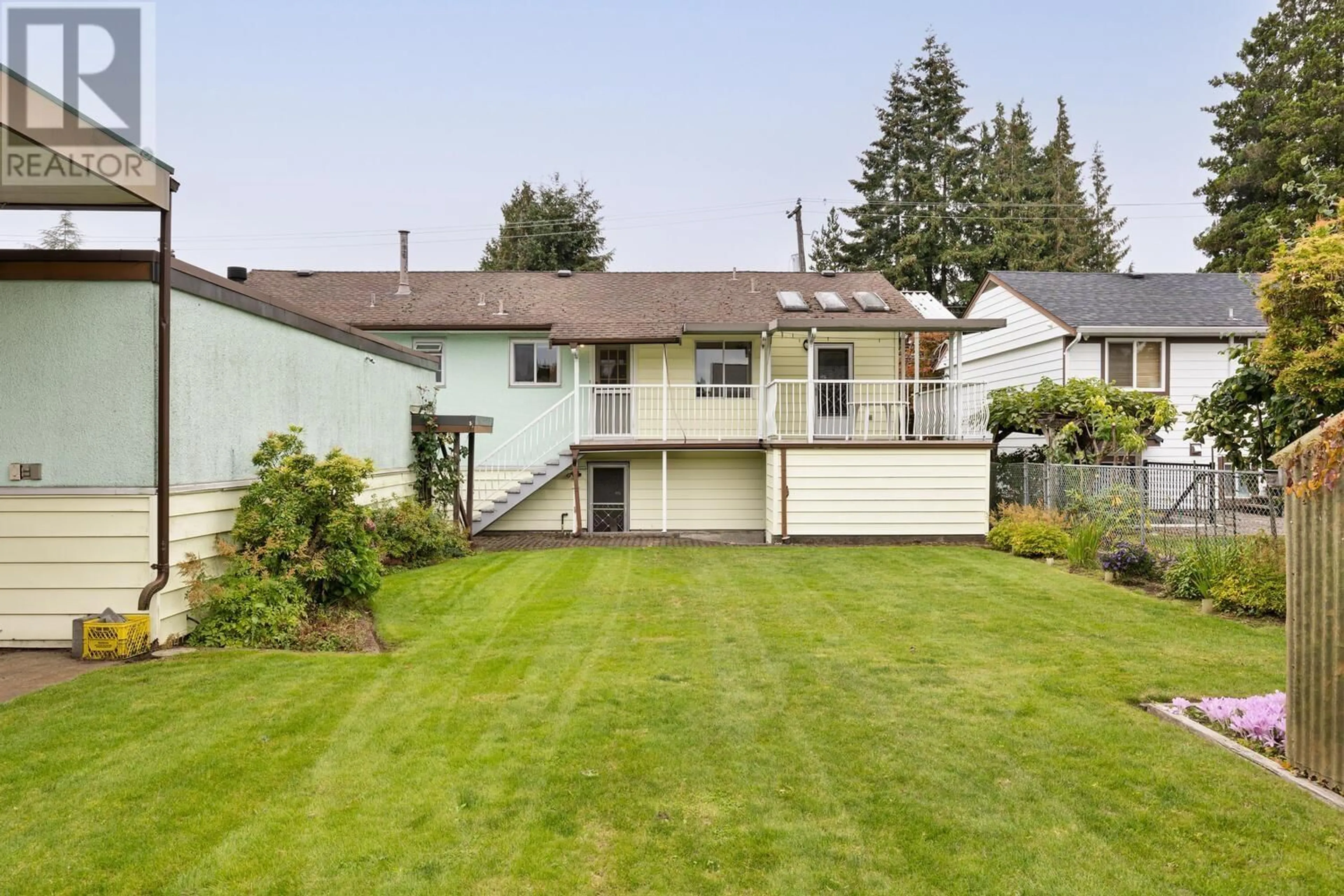 Frontside or backside of a home, the fenced backyard for 739 SCHOOLHOUSE STREET, Coquitlam British Columbia V3J5S1