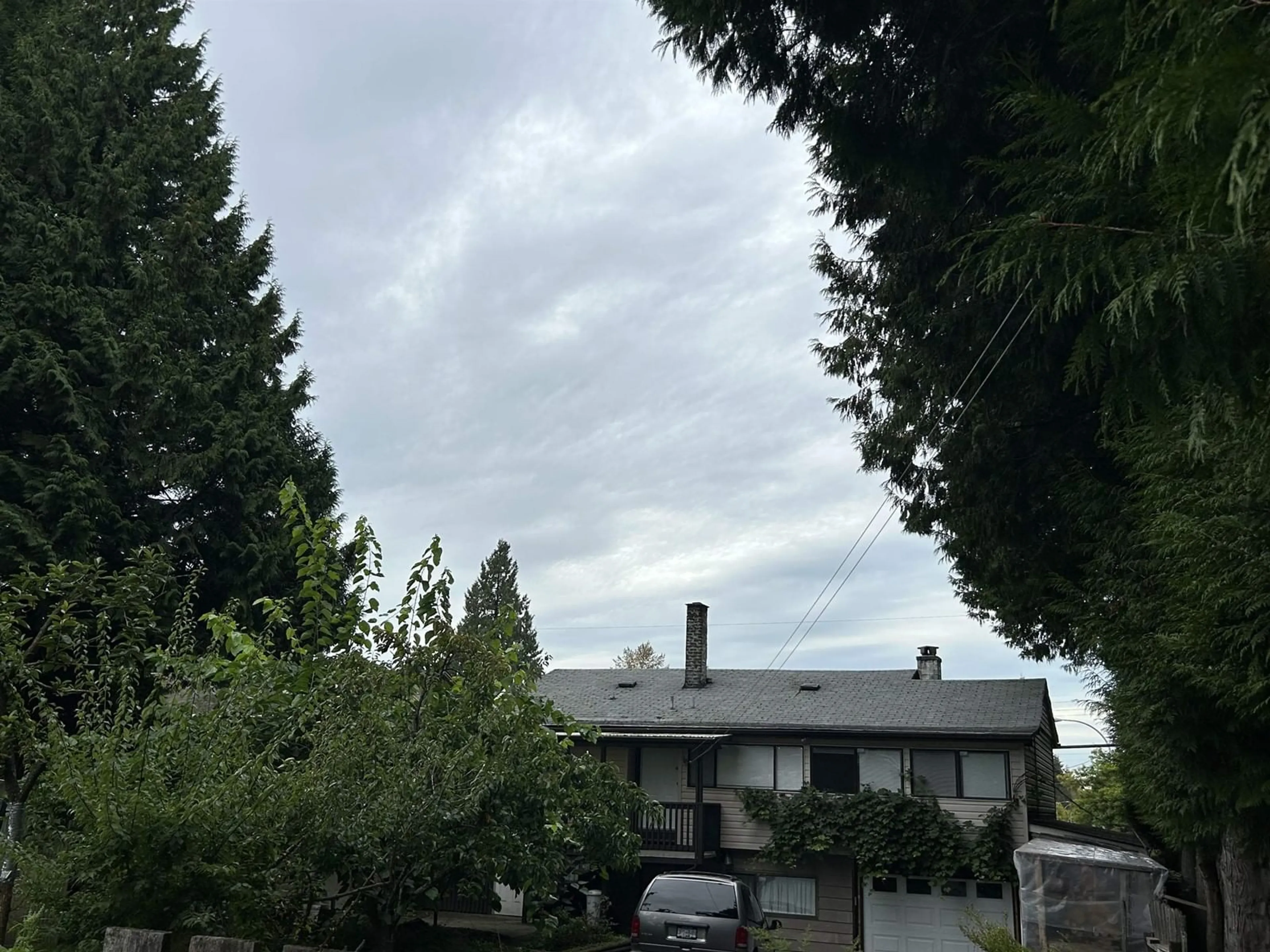 A pic from outside/outdoor area/front of a property/back of a property/a pic from drone, mountain view for 10294 144, Surrey British Columbia V3T4V3