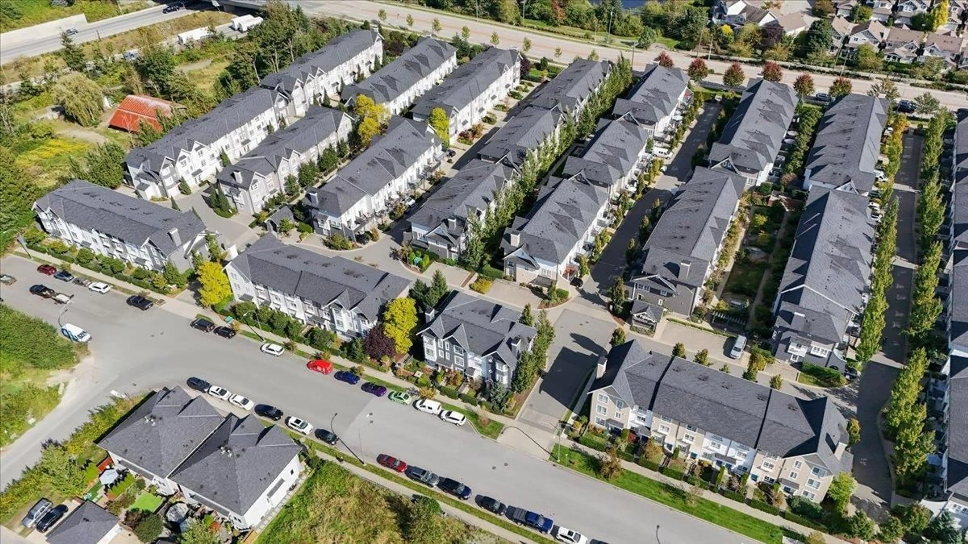 A pic from exterior of the house or condo, the street view for 57 8476 207A STREET, Langley British Columbia V2Y0S6