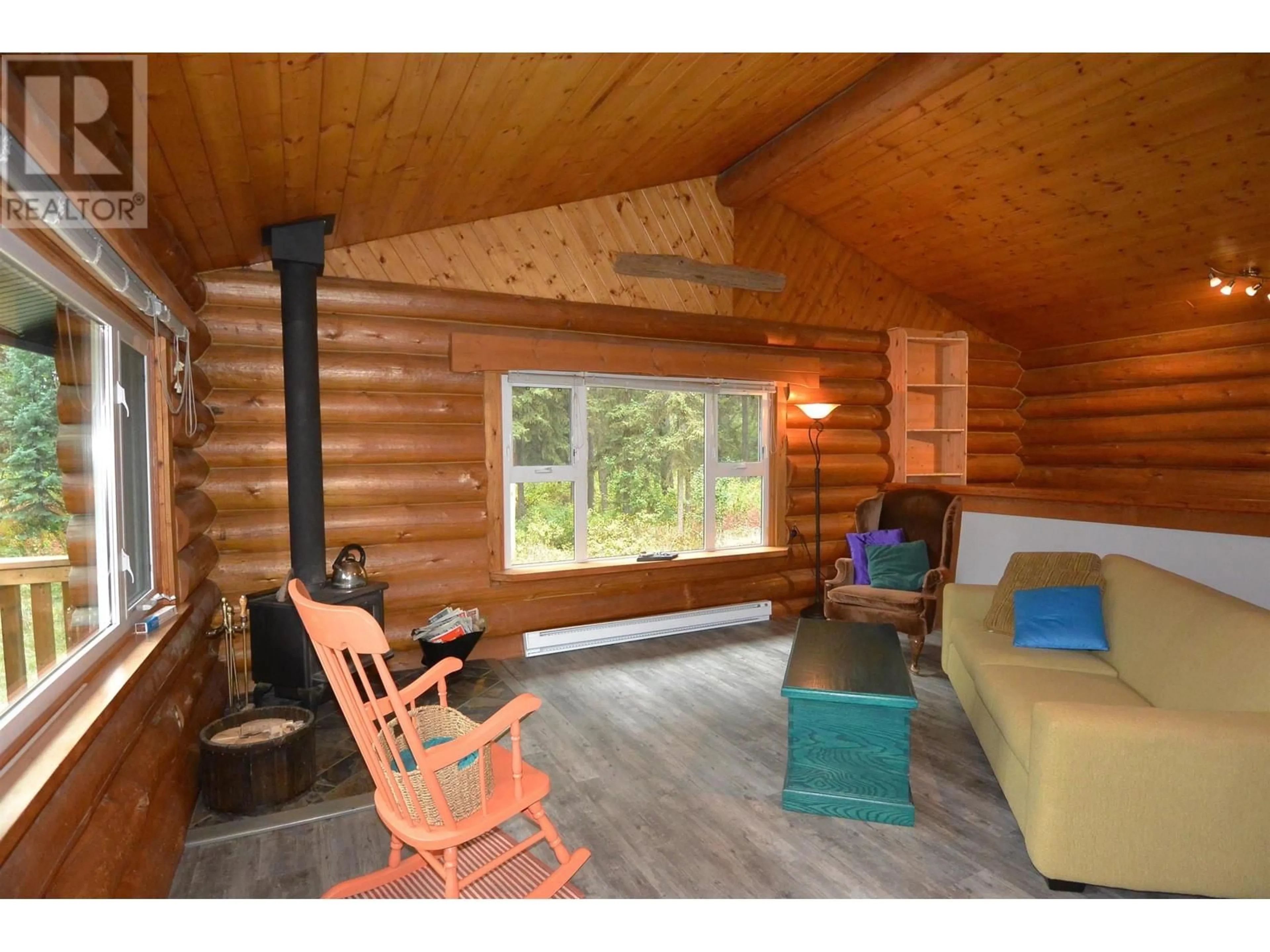 Living room with furniture, wood/laminate floor for 1371 DOGWOOD STREET, Telkwa British Columbia V0J2X0