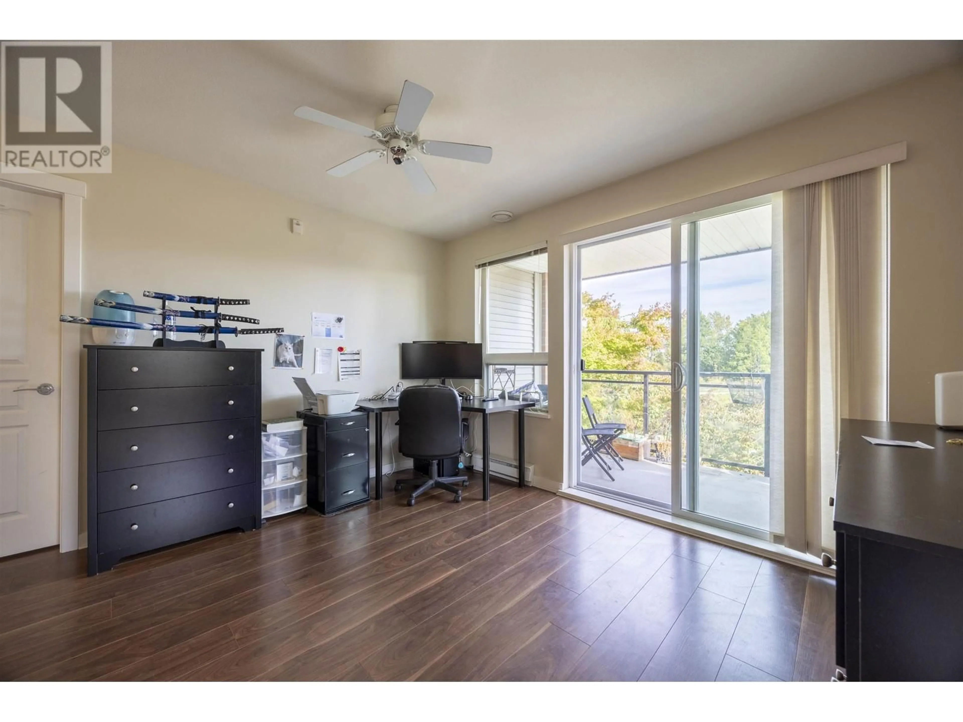 A pic of a room, wood floors for 211 9500 ODLIN ROAD, Richmond British Columbia V6X0H5