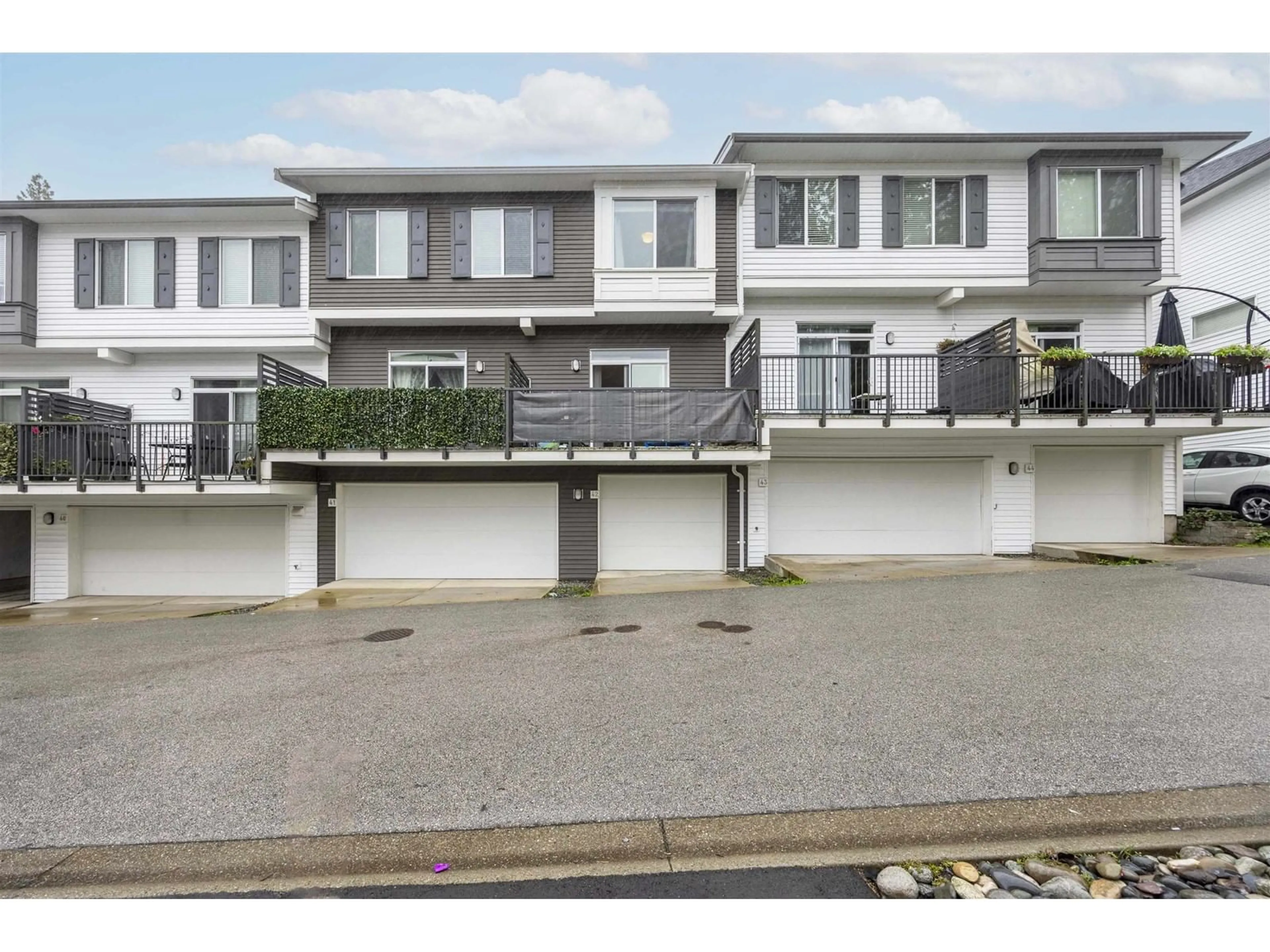 A pic from outside/outdoor area/front of a property/back of a property/a pic from drone, street for 42 - 8130 136A, Surrey British Columbia V3W1H9