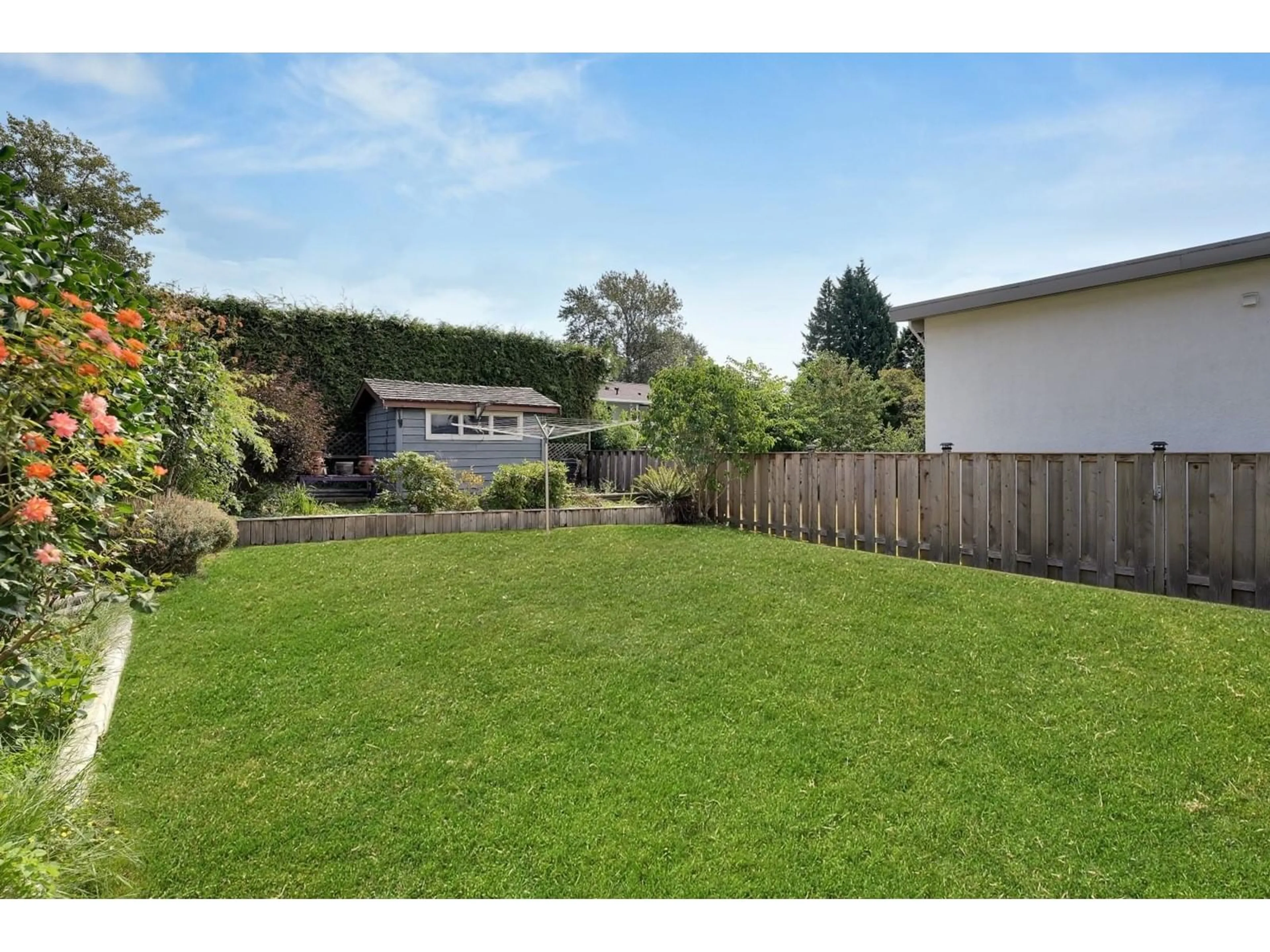 Frontside or backside of a home, the fenced backyard for 7540 E MINSTER DRIVE, Delta British Columbia V4C4M5