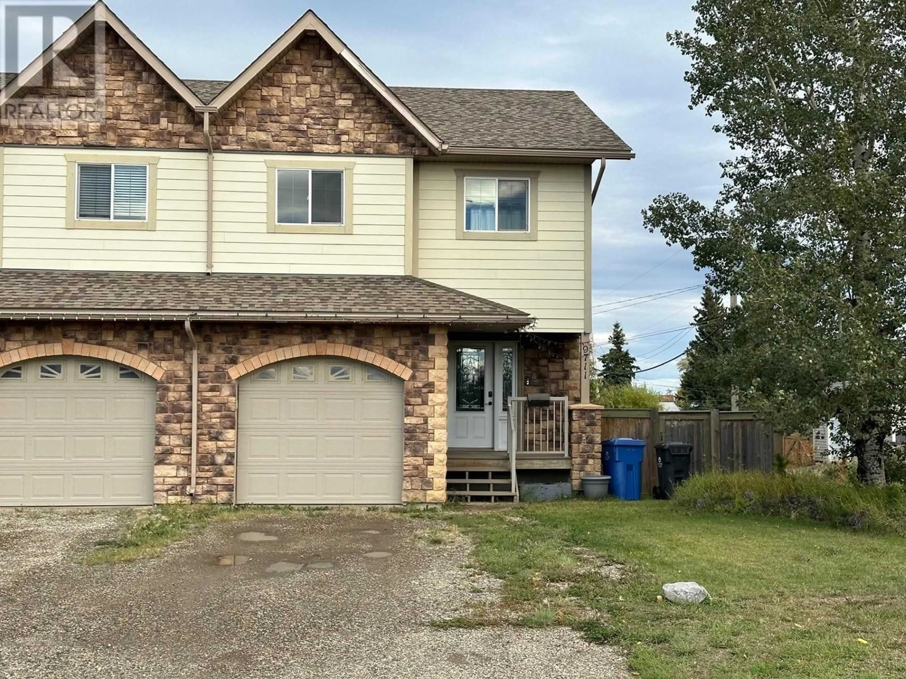 Frontside or backside of a home for 9711 86 STREET, Fort St. John British Columbia V1J3G3