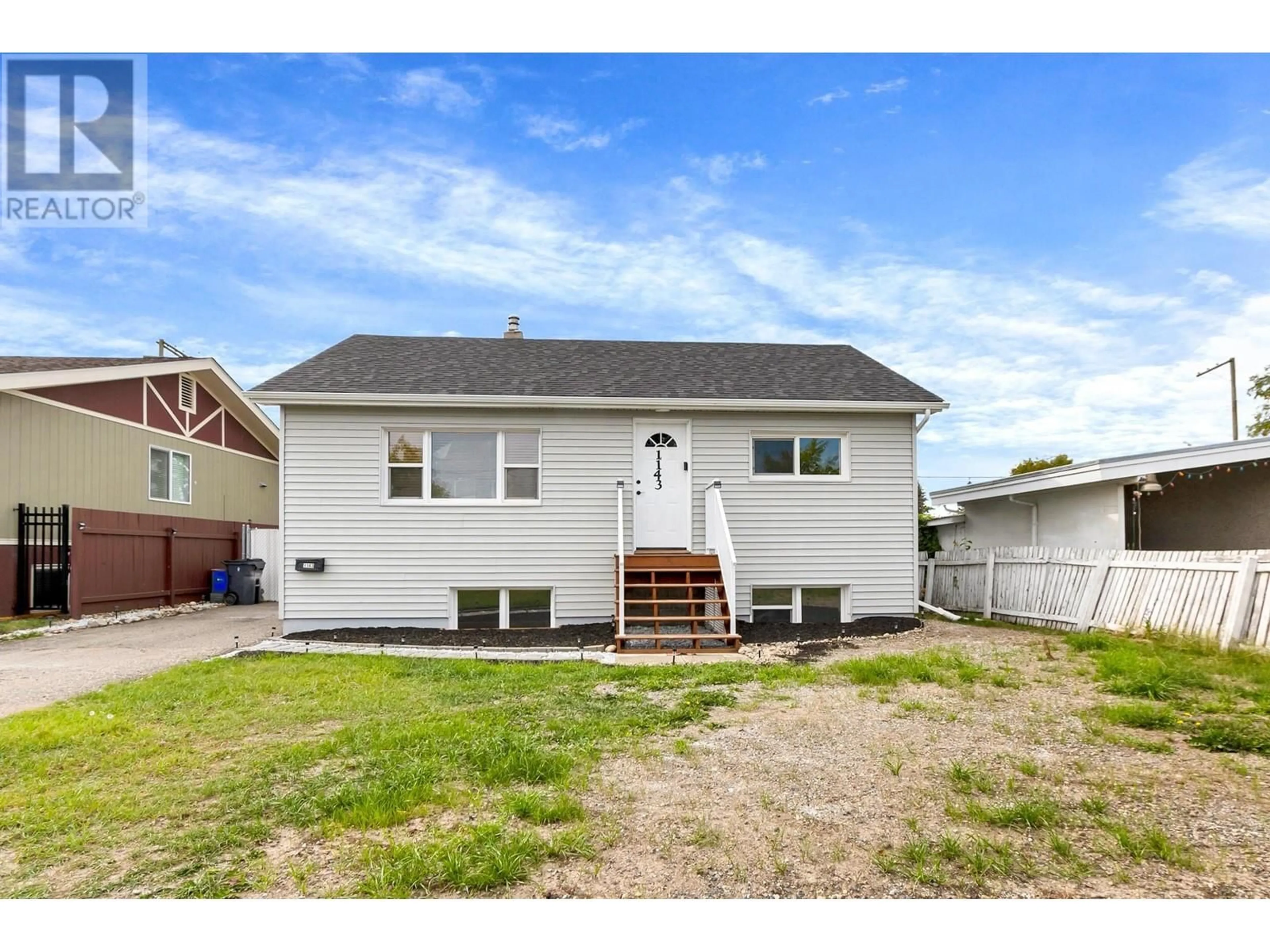 Frontside or backside of a home, the fenced backyard for 1143 CARNEY STREET, Prince George British Columbia V2M3L1