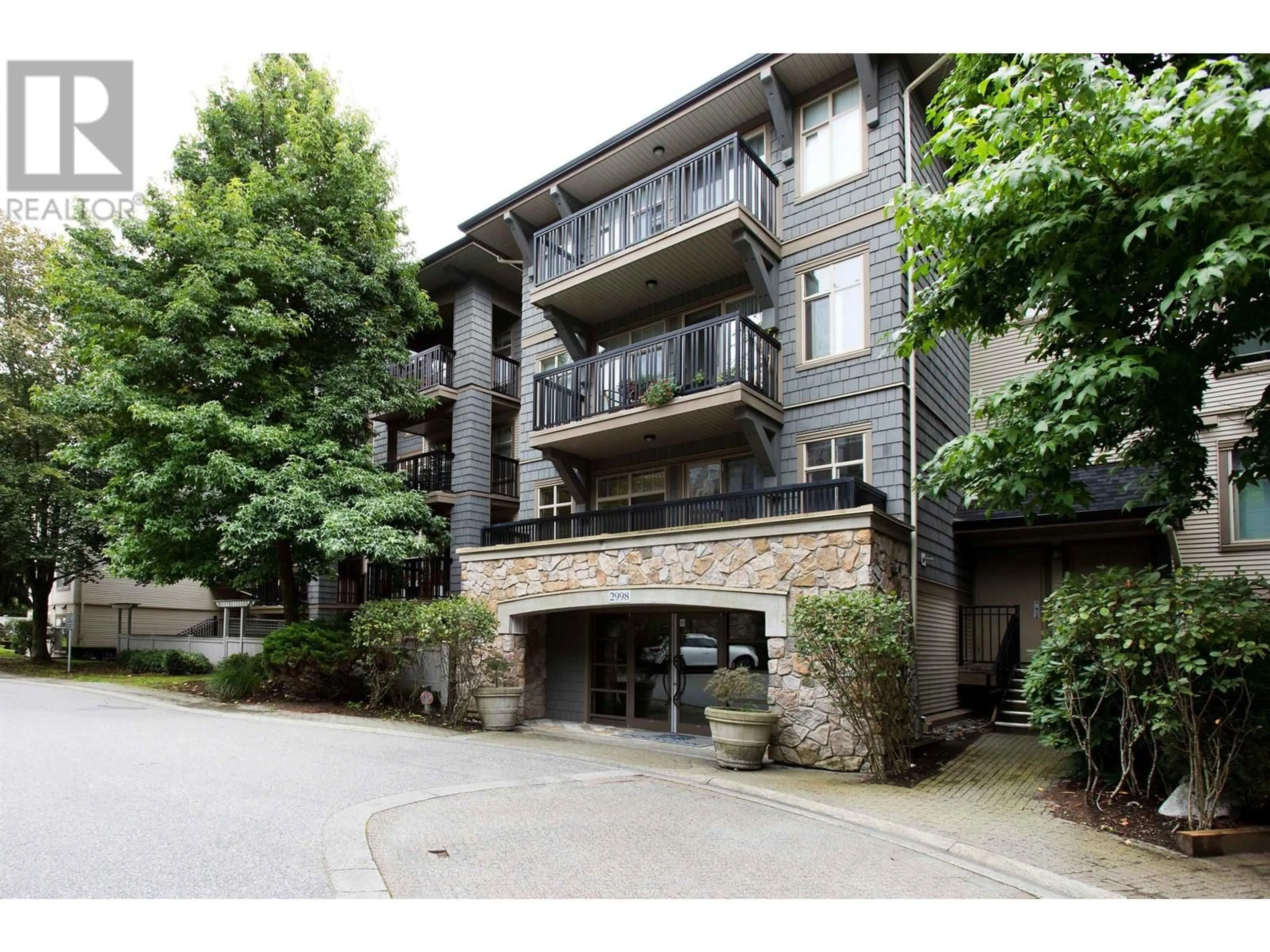 A pic from exterior of the house or condo, the front or back of building for 302 2998 SILVER SPRINGS BOULEVARD, Coquitlam British Columbia V3E3R7