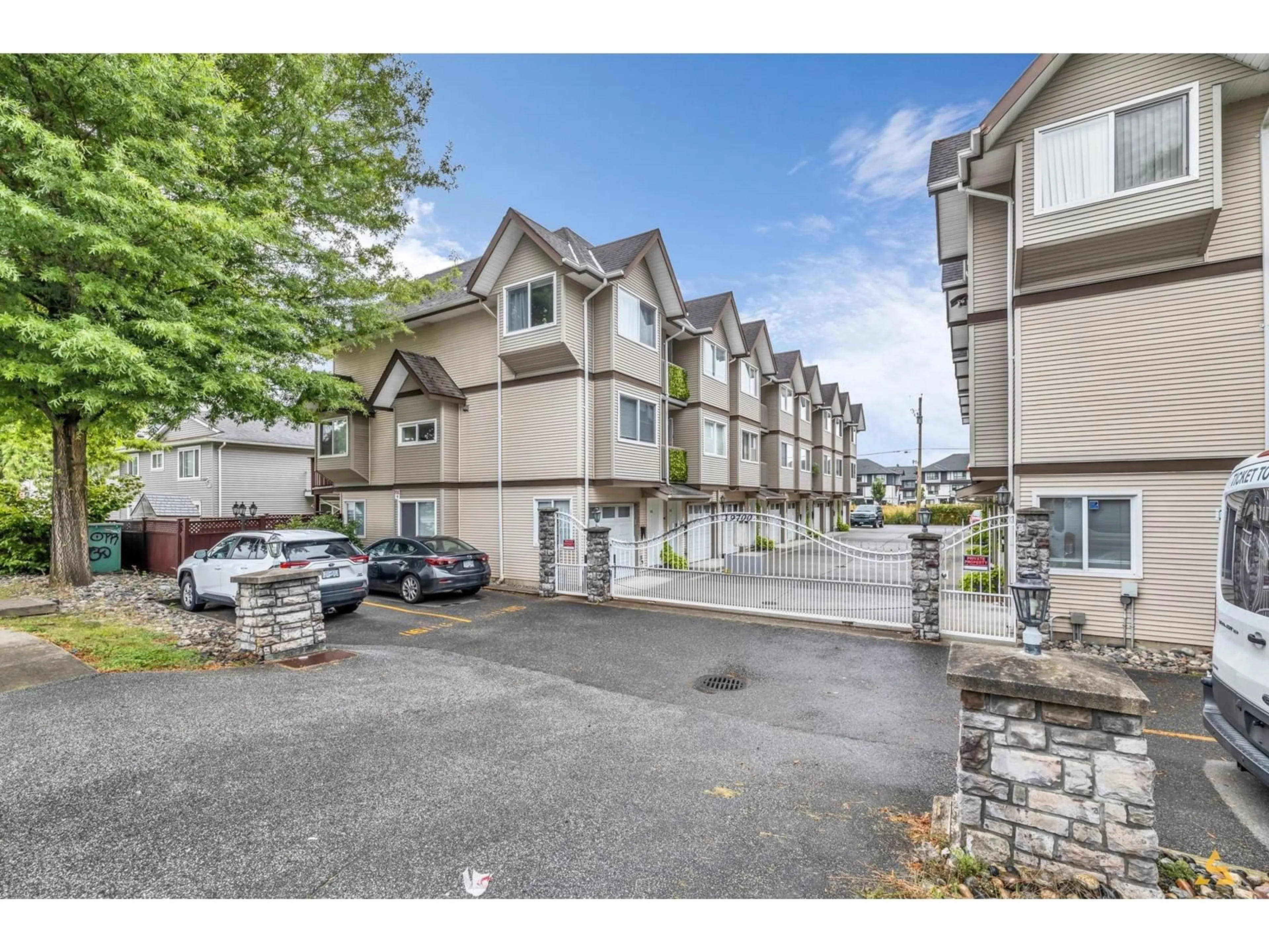 A pic from exterior of the house or condo, the street view for 112 19700 56 AVENUE, Langley British Columbia V3A3X6