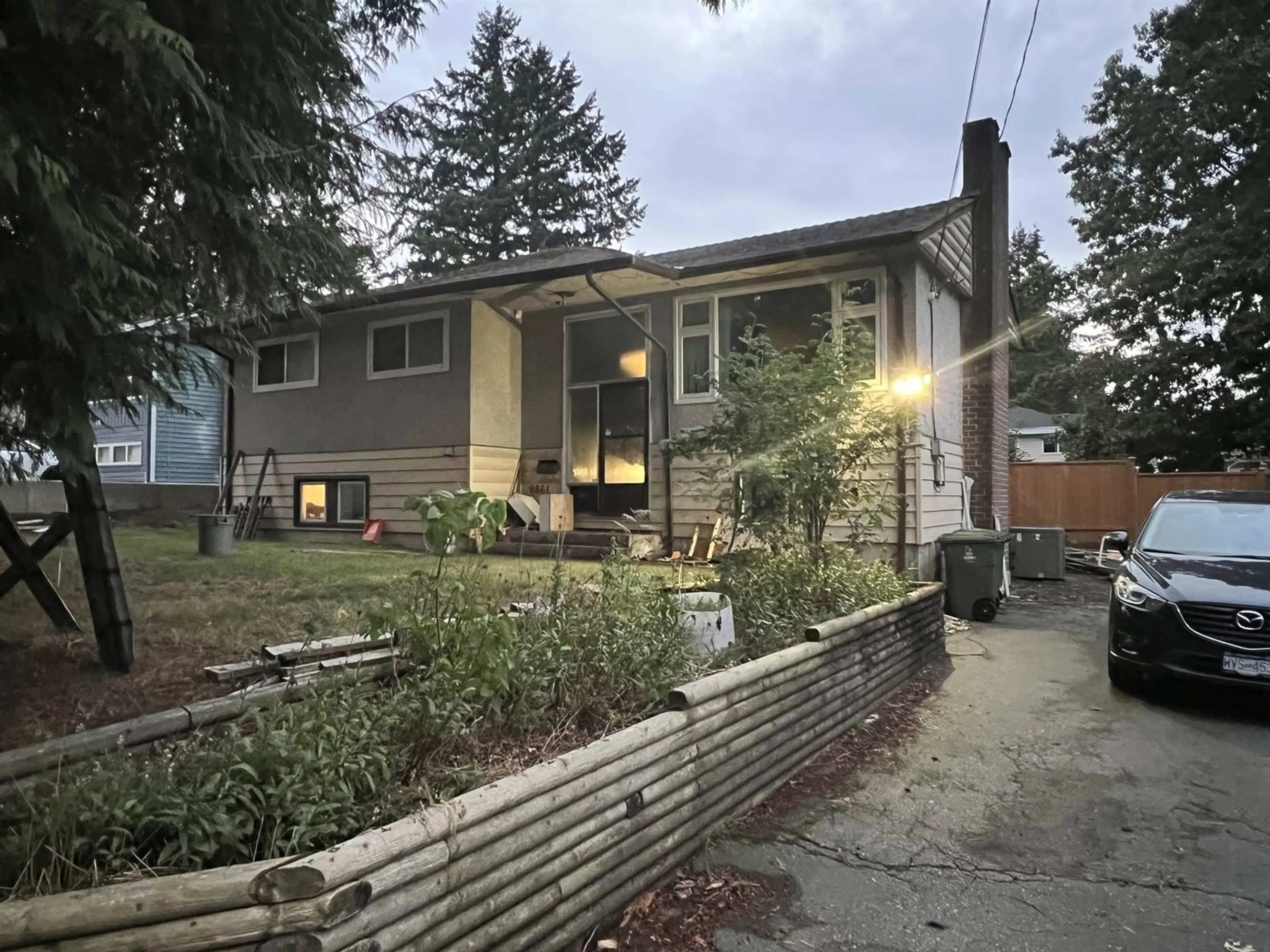 Frontside or backside of a home, the fenced backyard for 9861 124A STREET, Surrey British Columbia V3V4W2