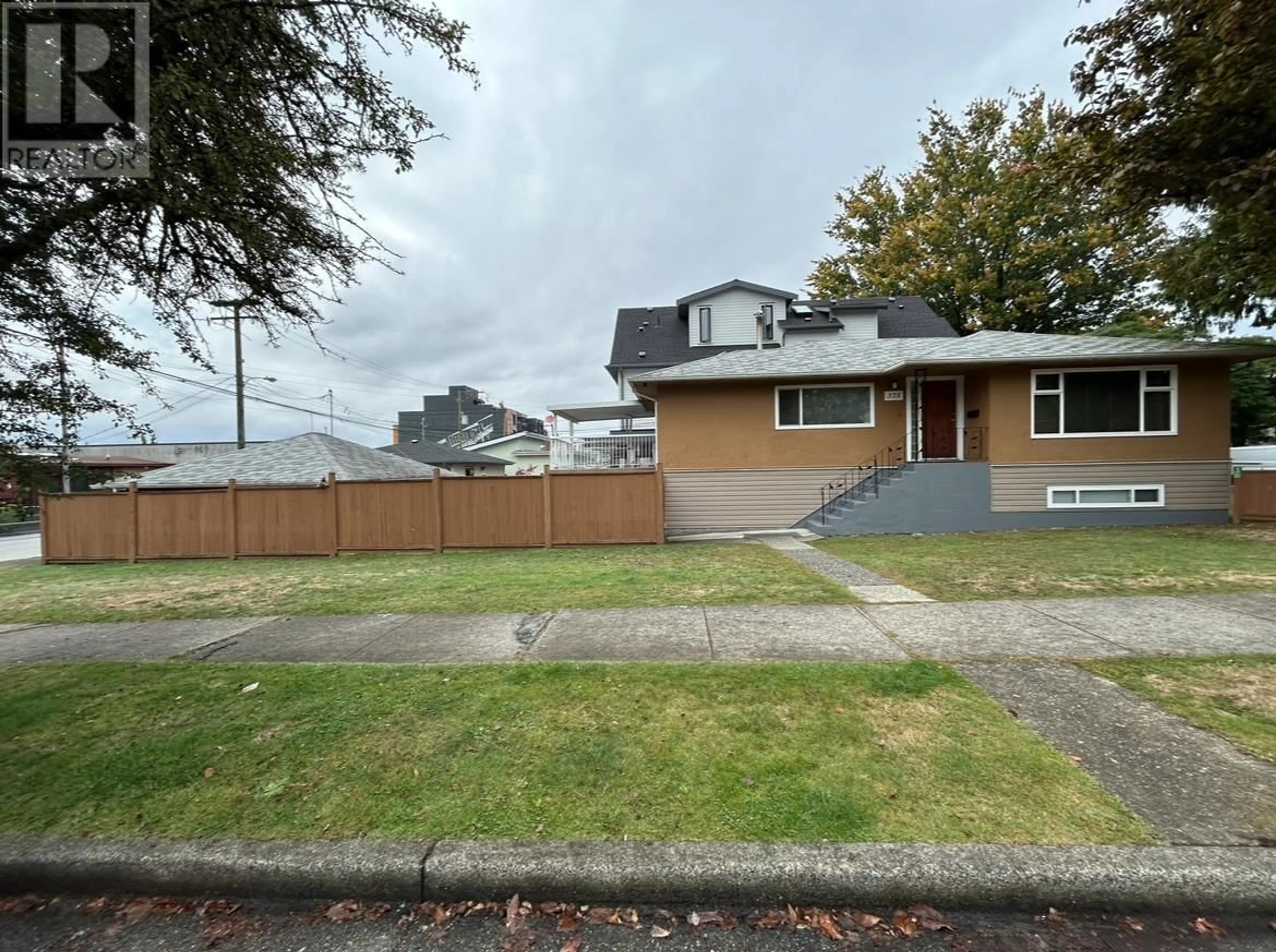 Frontside or backside of a home, the street view for 375 SKEENA STREET, Vancouver British Columbia V5K4N9