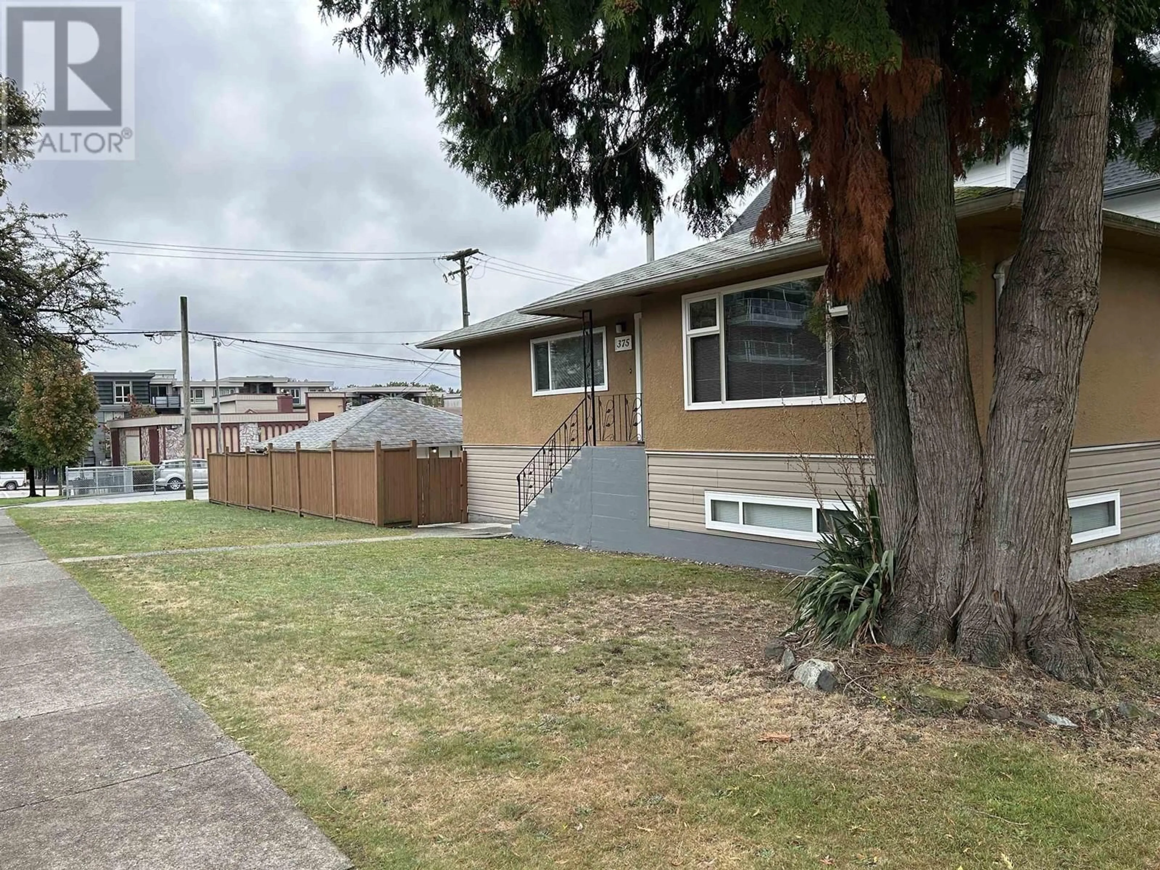 Frontside or backside of a home, the fenced backyard for 375 SKEENA STREET, Vancouver British Columbia V5K4N9