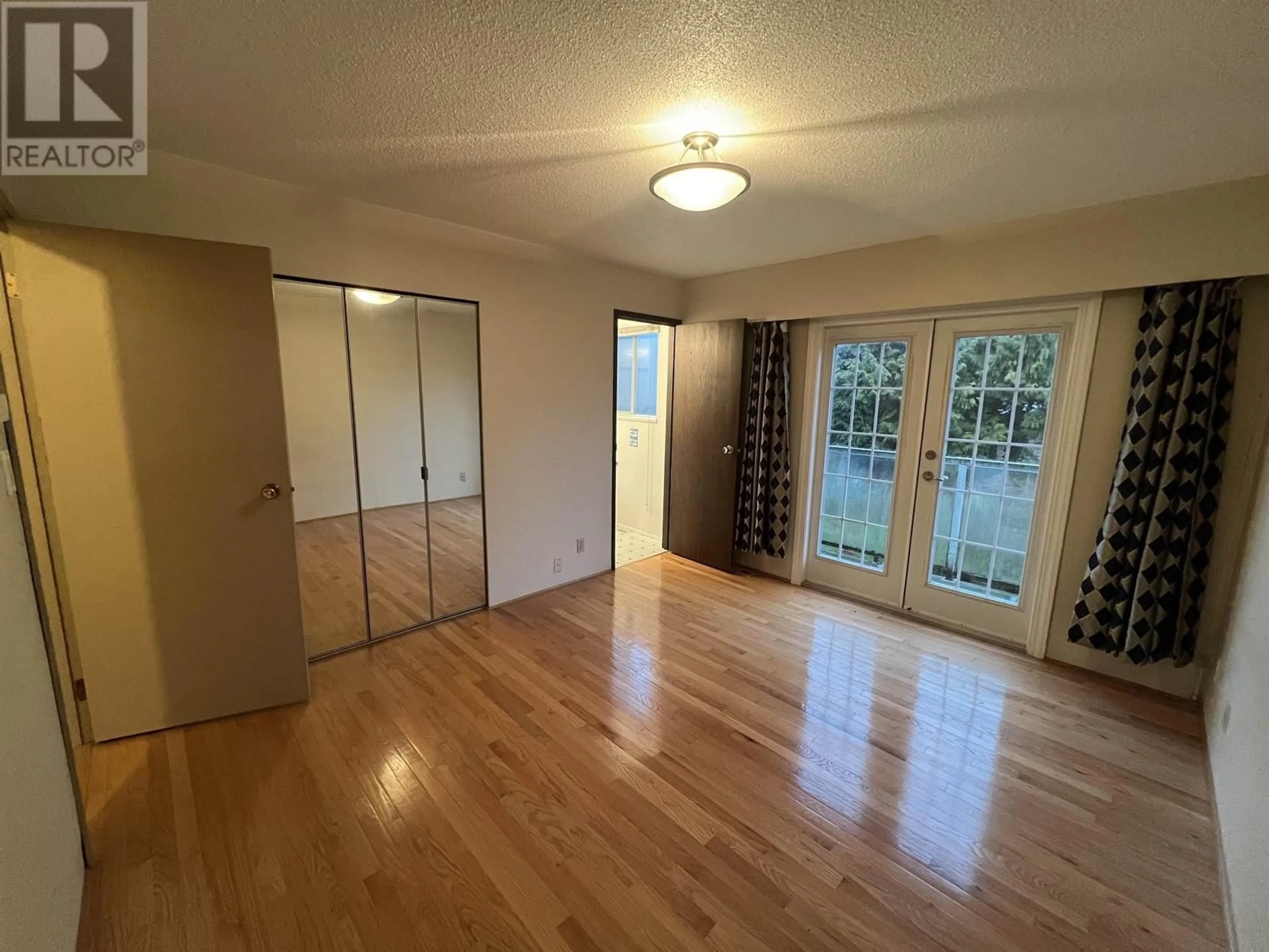 A pic of a room, wood floors for 4651 LARKSPUR AVENUE, Richmond British Columbia V7C2H9