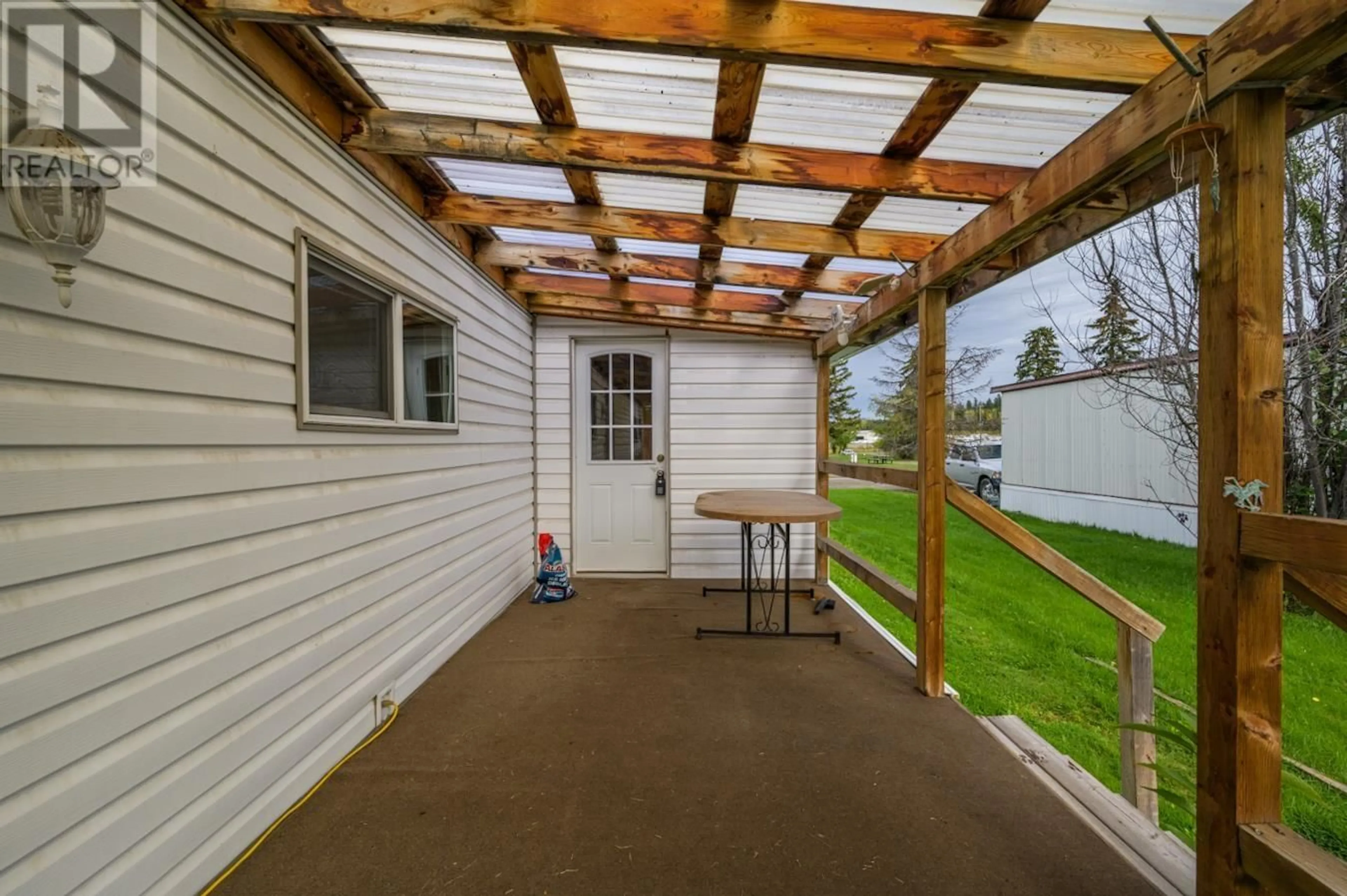 Patio, the fenced backyard for 122 7817 S 97 HIGHWAY, Prince George British Columbia V2N6C9