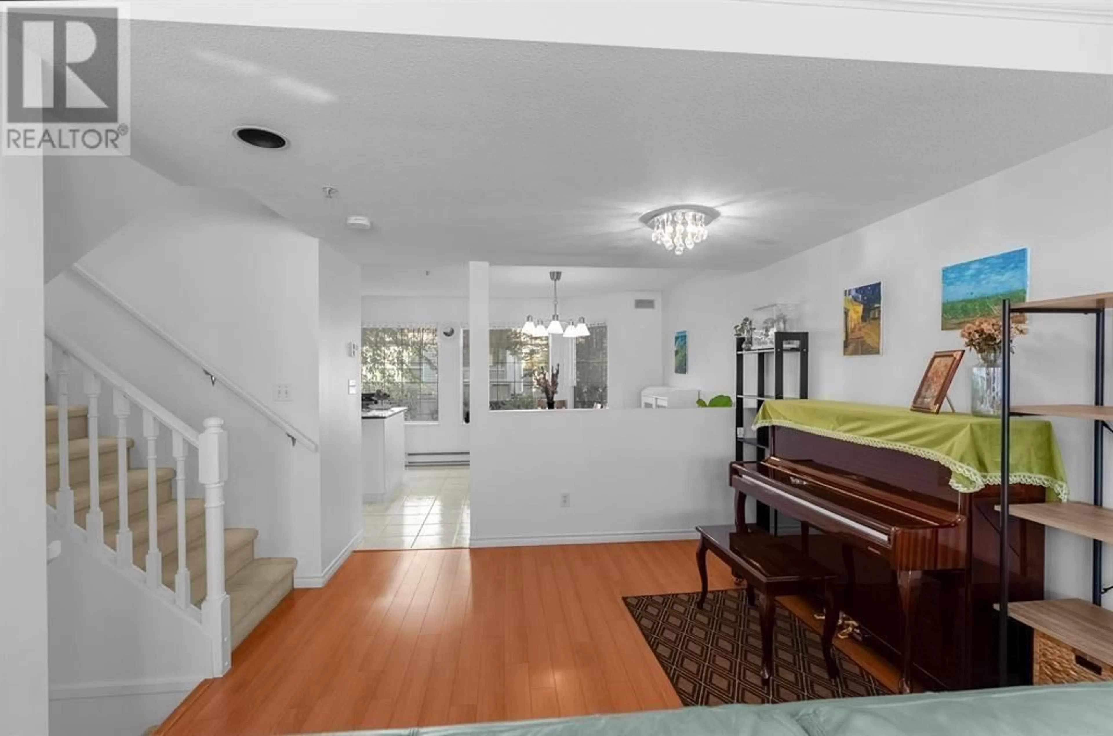 Indoor foyer, wood floors for 7 8711 JONES ROAD, Richmond British Columbia V6Y1L7