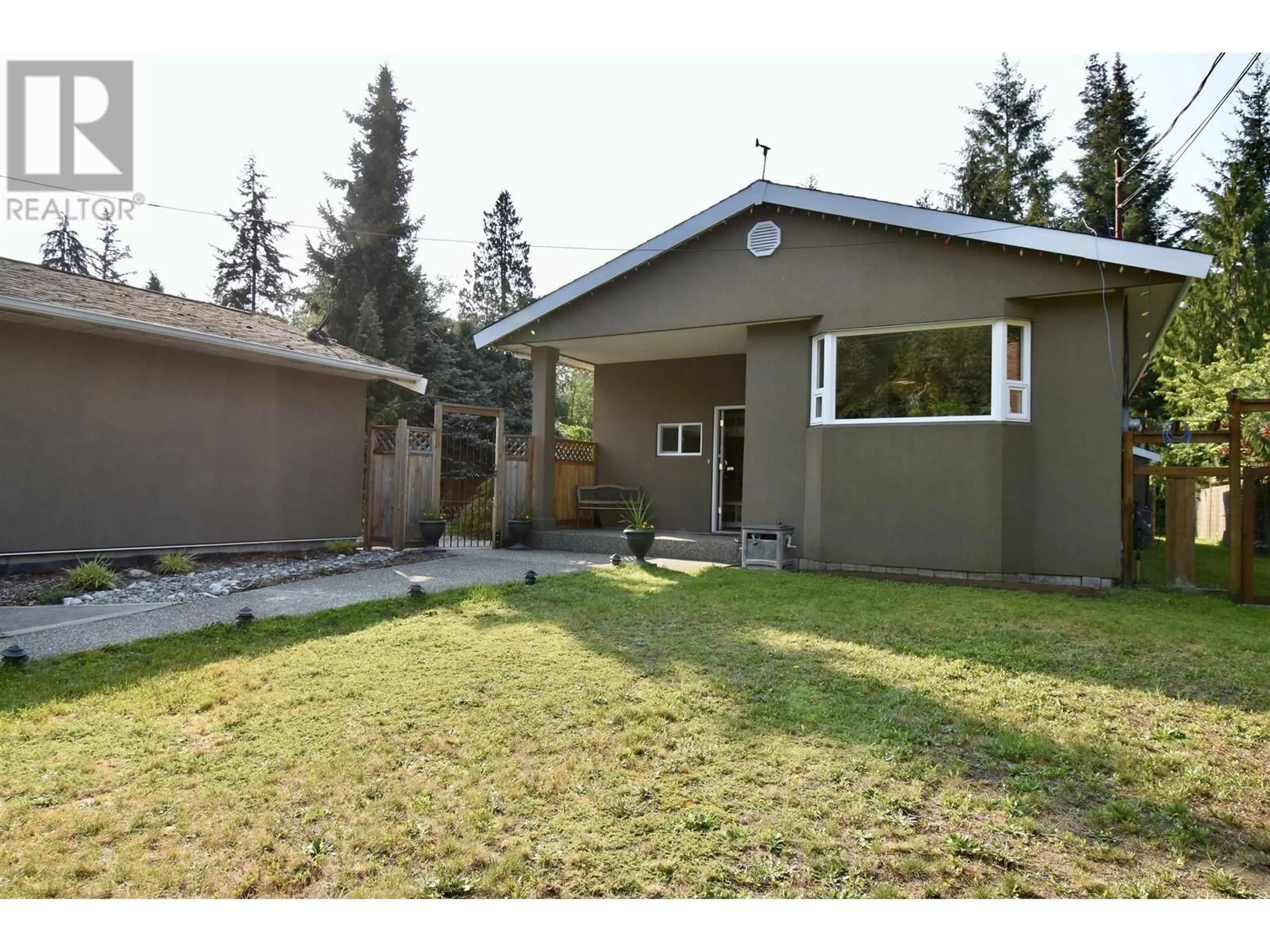 Frontside or backside of a home, the fenced backyard for 1327 KEARTON ROAD, Gibsons British Columbia V0N1V4