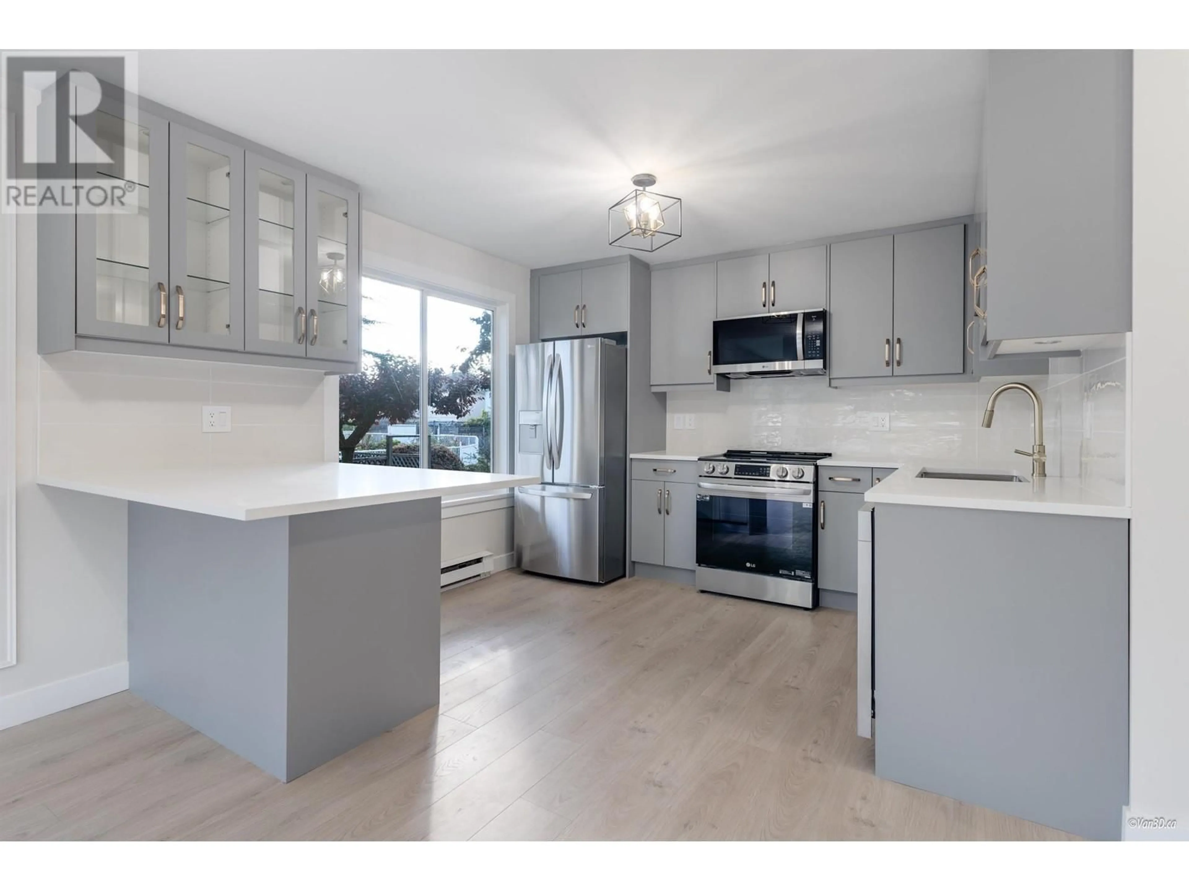 Open concept kitchen for 117 5875 IMPERIAL STREET, Burnaby British Columbia V5J1G4