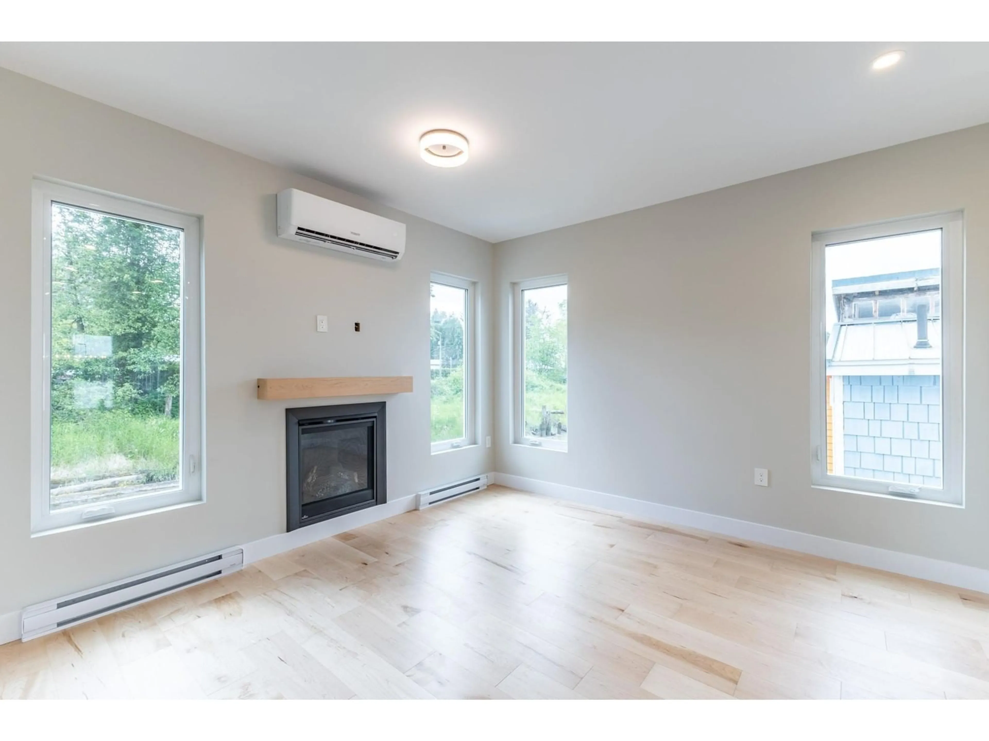 A pic of a room, wood floors for 6 20837 LOUIE CRESCENT, Langley British Columbia V1M3H7