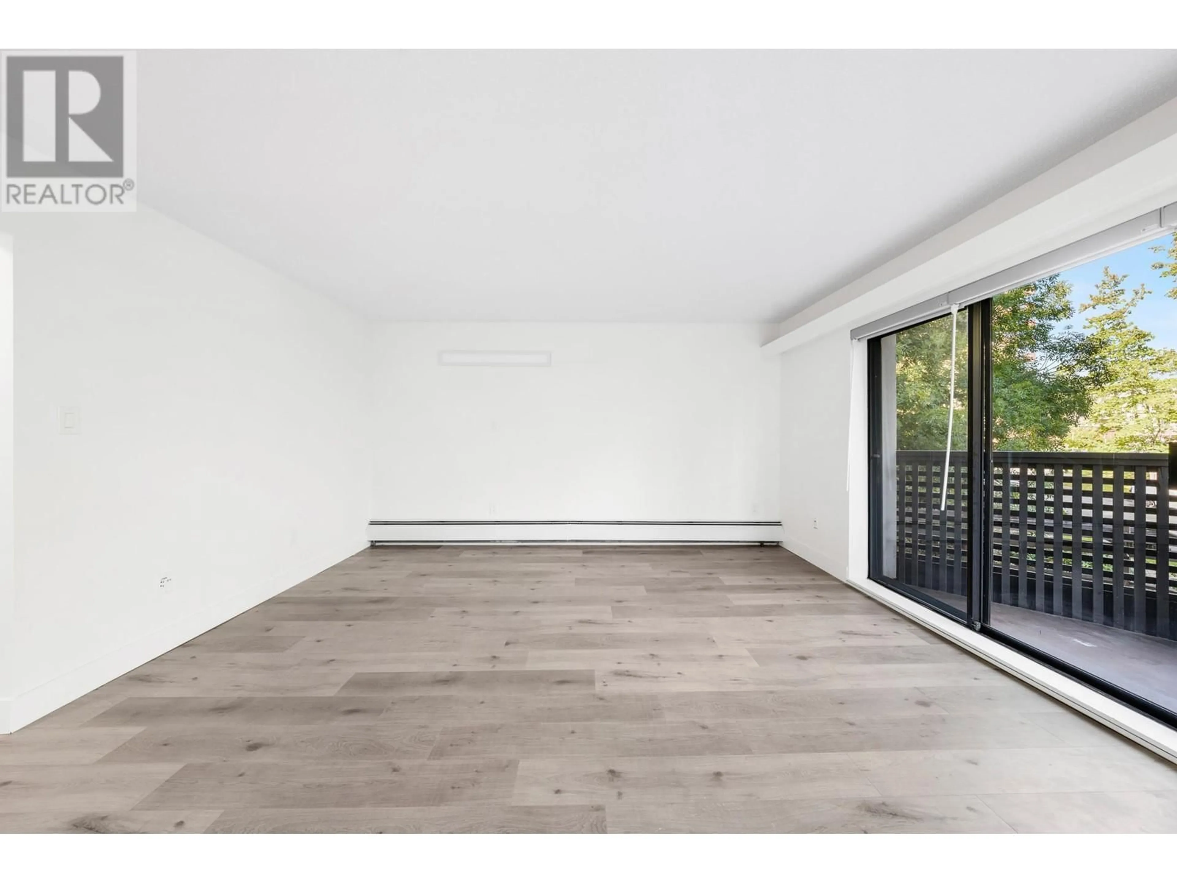 A pic of a room, wood floors for 205 1945 WOODWAY PLACE, Burnaby British Columbia V5B4S4