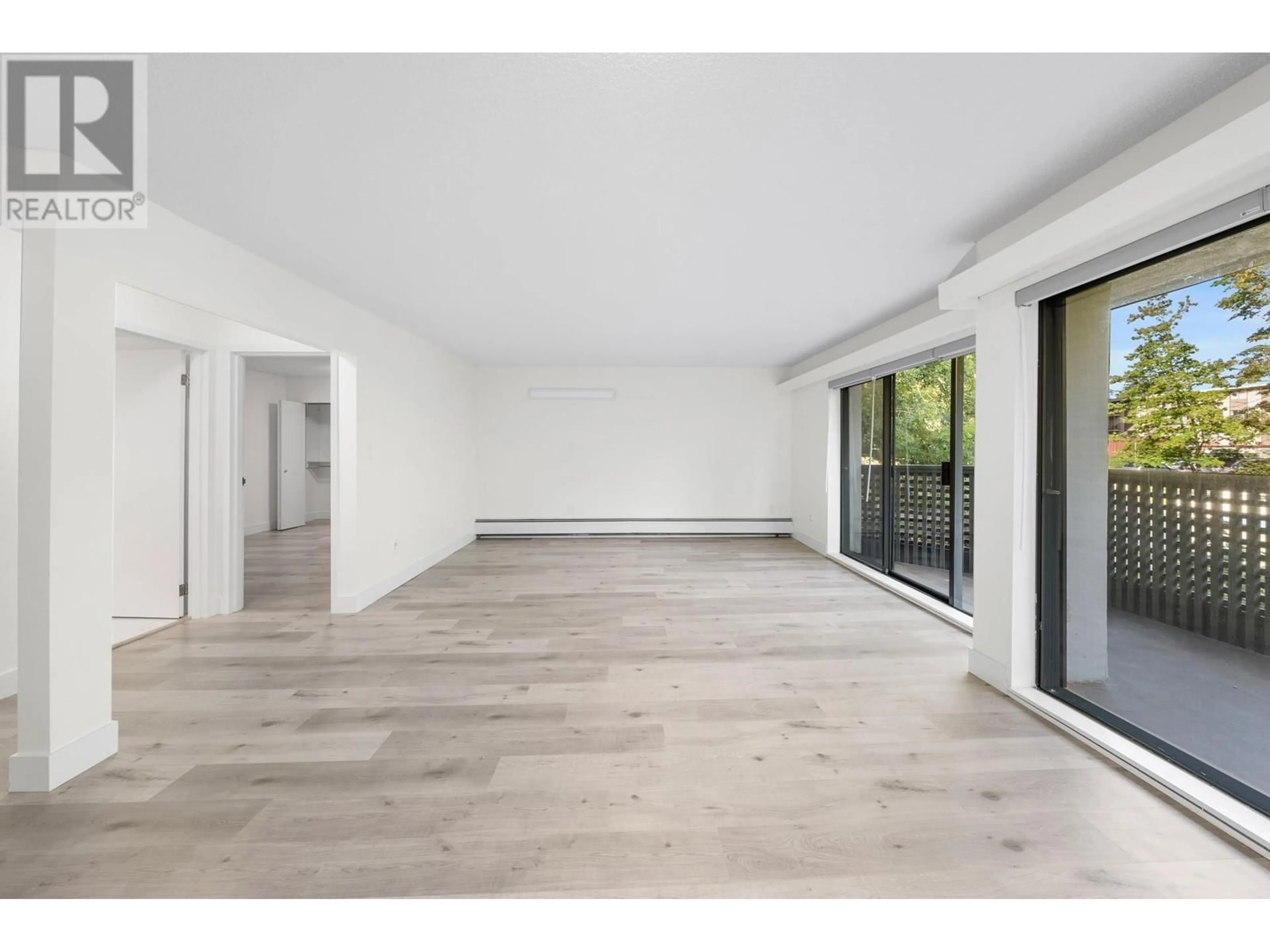 A pic of a room, wood floors for 205 1945 WOODWAY PLACE, Burnaby British Columbia V5B4S4