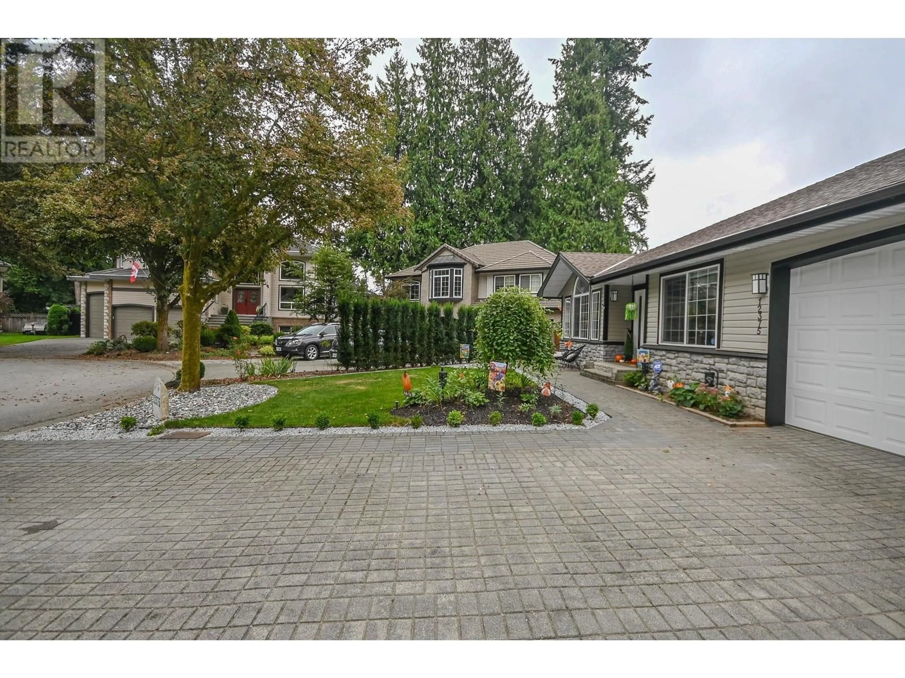 Frontside or backside of a home, the street view for 12375 214 STREET, Maple Ridge British Columbia V2X4H2