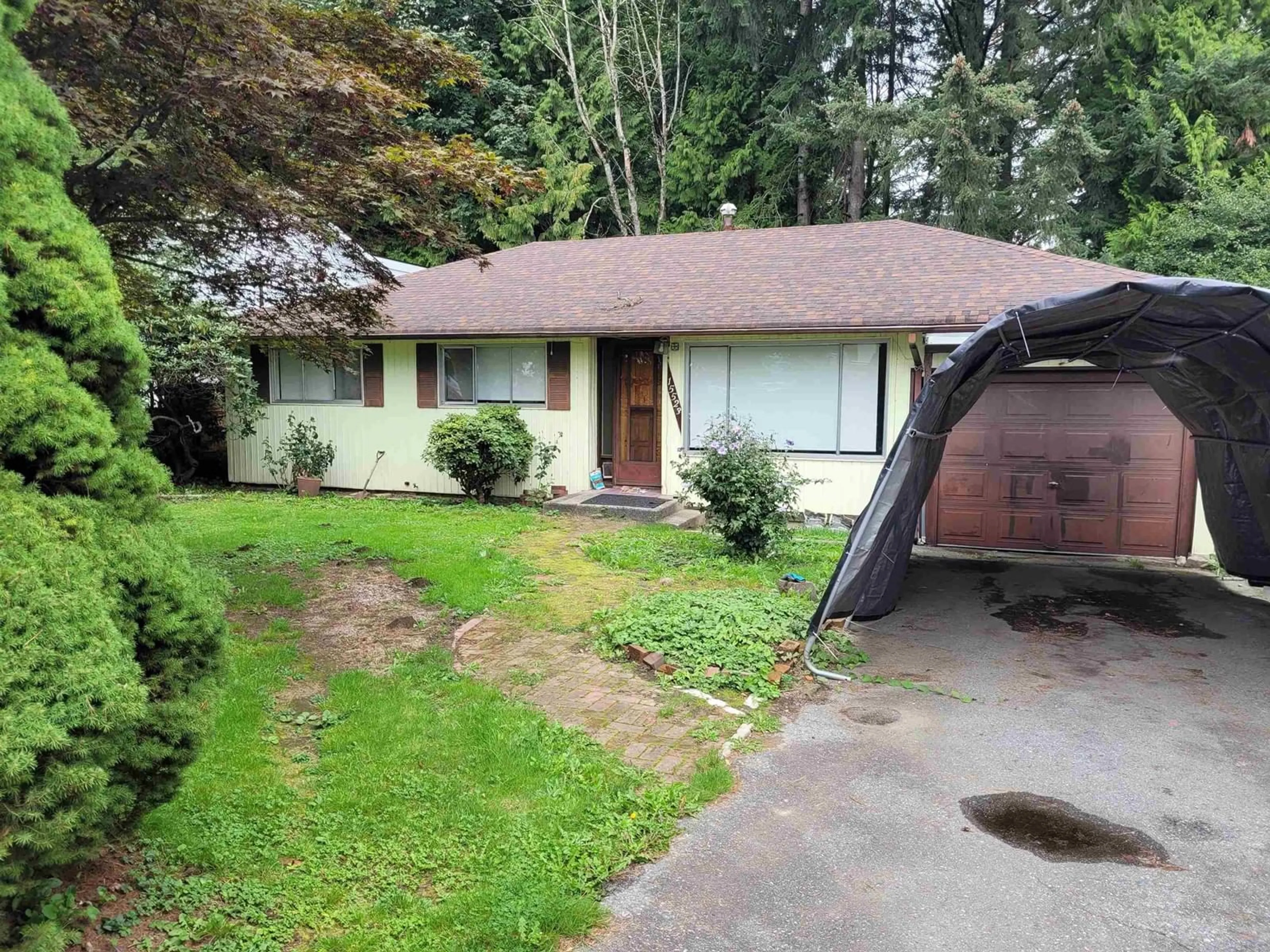 Frontside or backside of a home for 15523 105A AVENUE, Surrey British Columbia V3R1S7