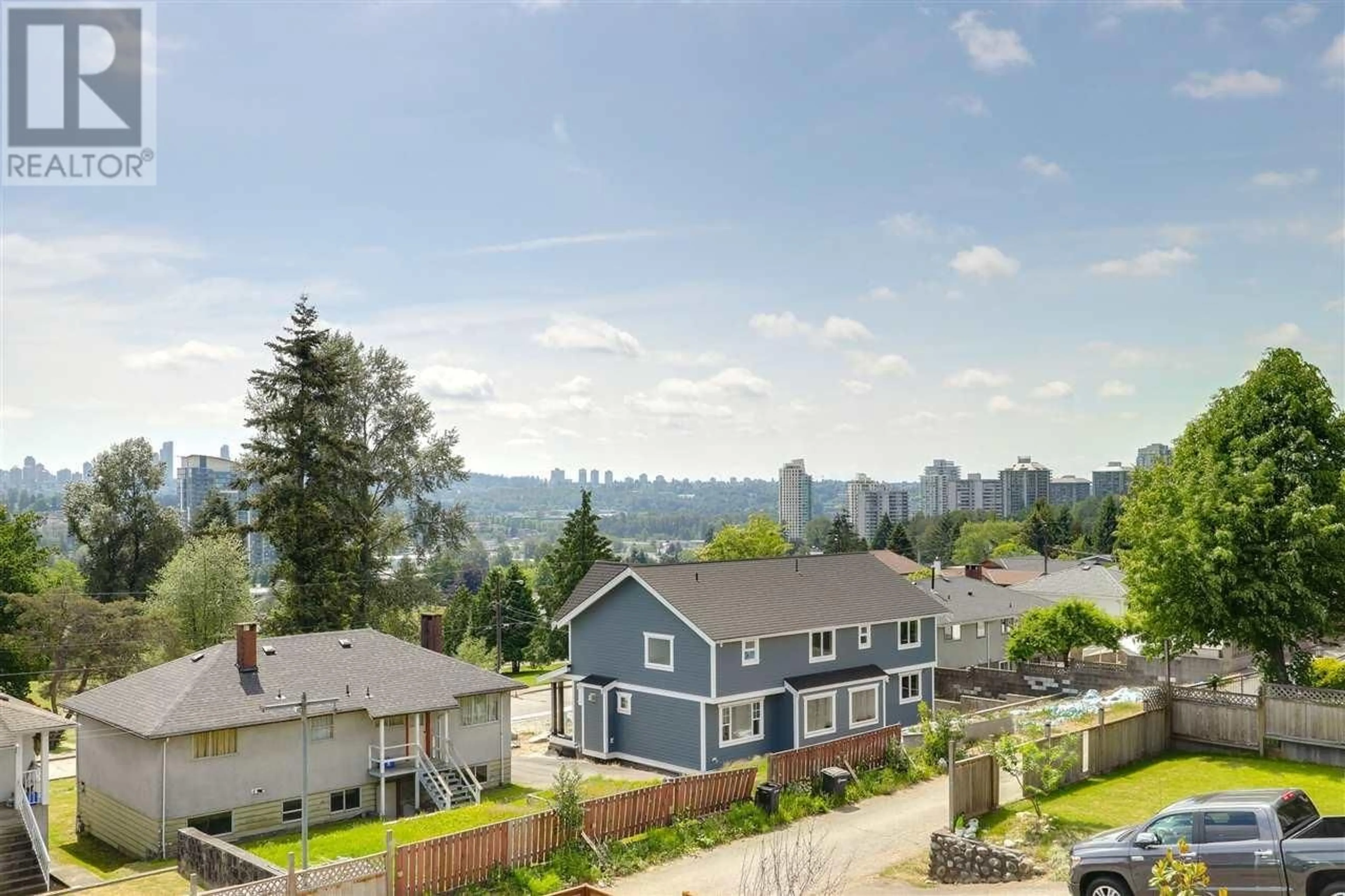 Frontside or backside of a home, the fenced backyard for 5970 GRANT STREET, Burnaby British Columbia V5B2K4