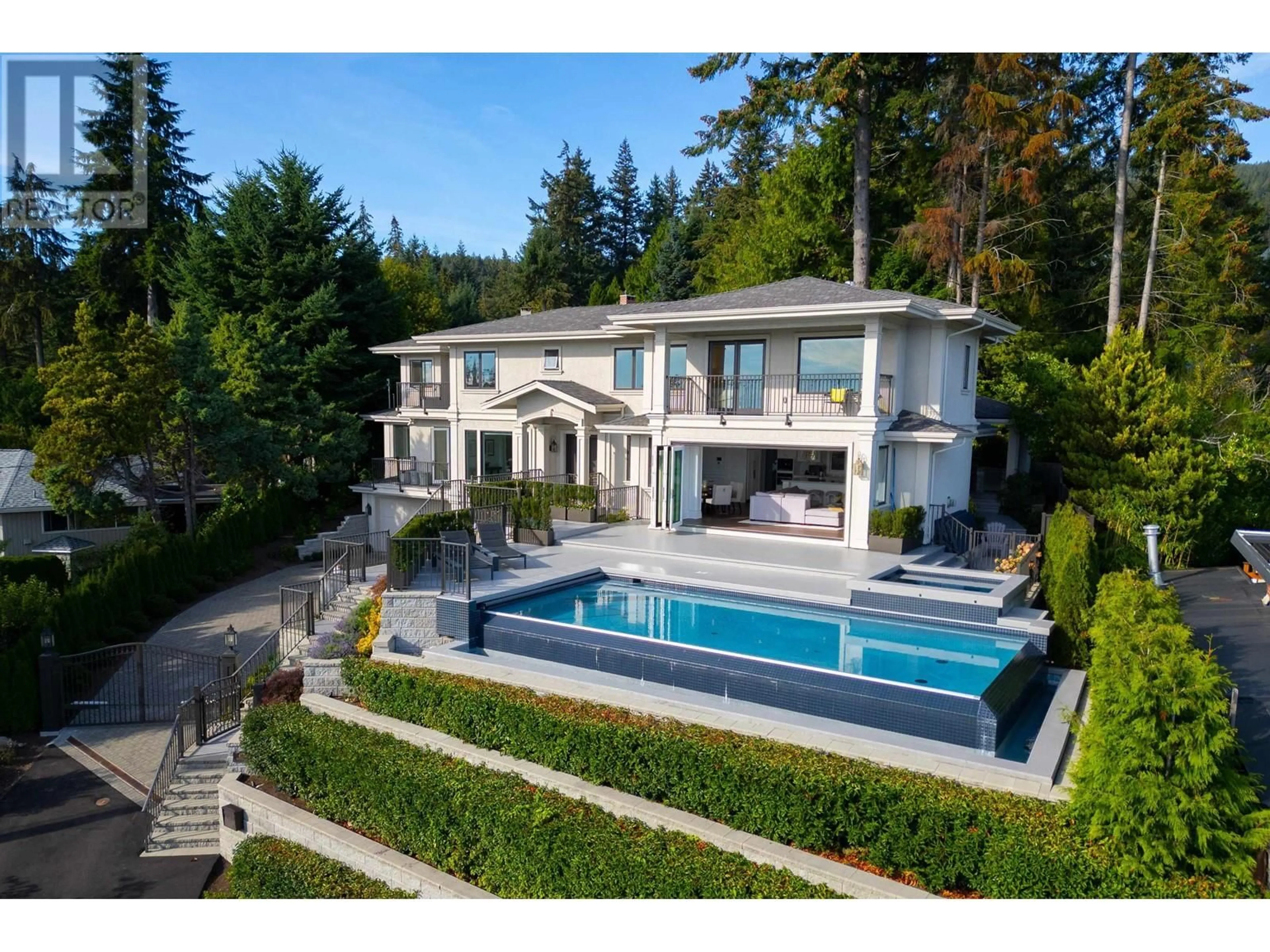 Frontside or backside of a home, the fenced backyard for 4135 BURKEHILL PLACE, West Vancouver British Columbia V7V3M8