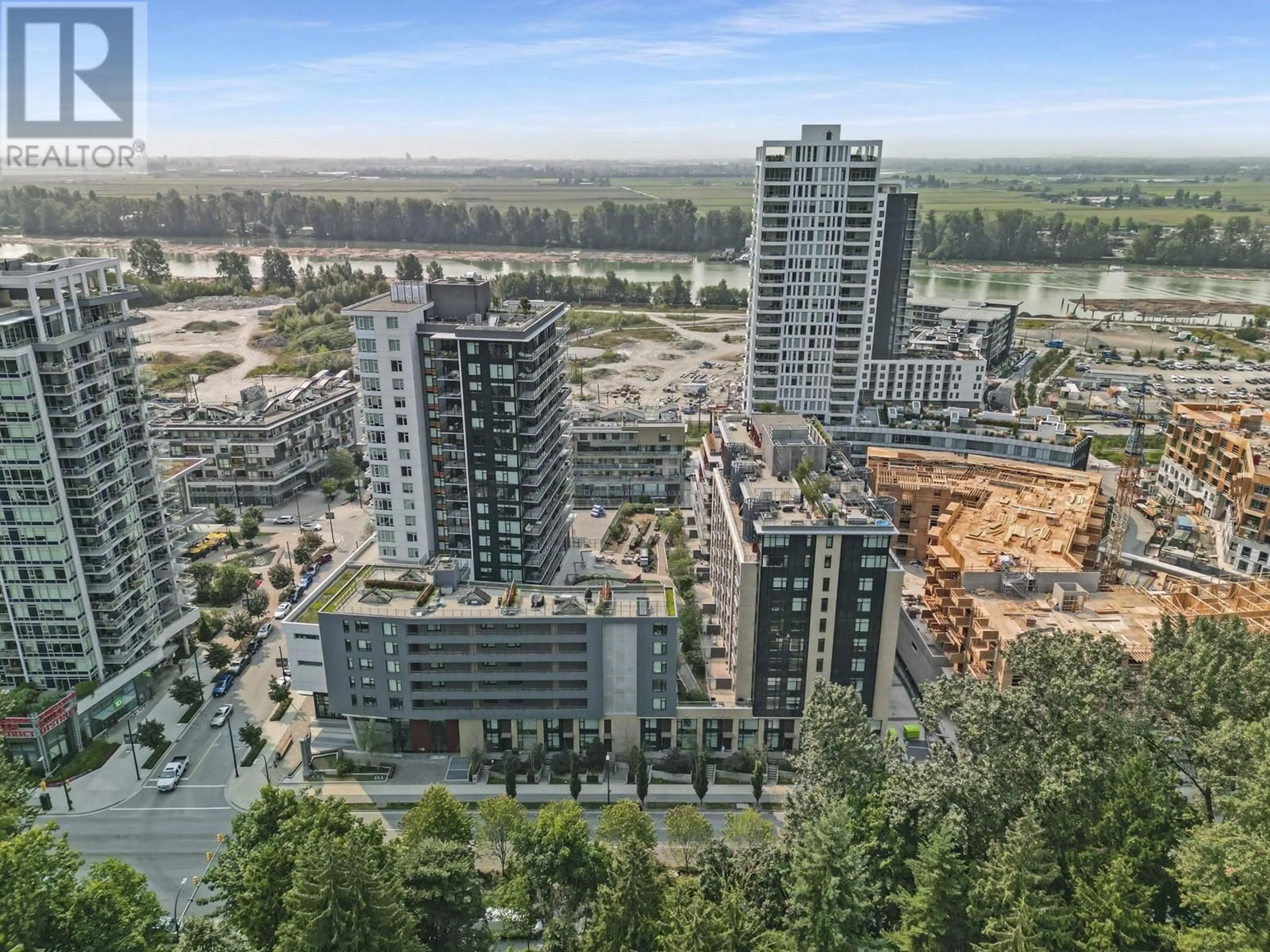 A pic from exterior of the house or condo, the view of city buildings for 102 3482 MARINE WAY, Vancouver British Columbia V5S0H1