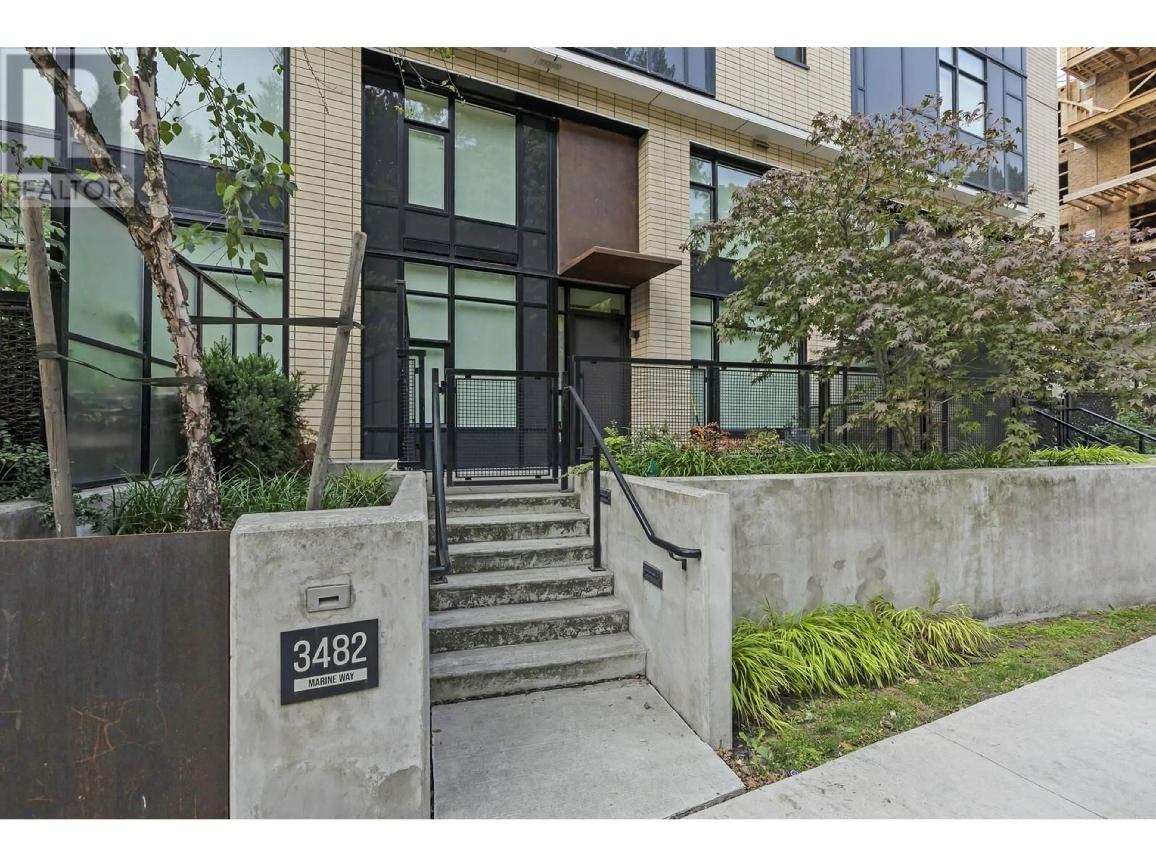 A pic from exterior of the house or condo, the street view for 102 3482 MARINE WAY, Vancouver British Columbia V5S0H1