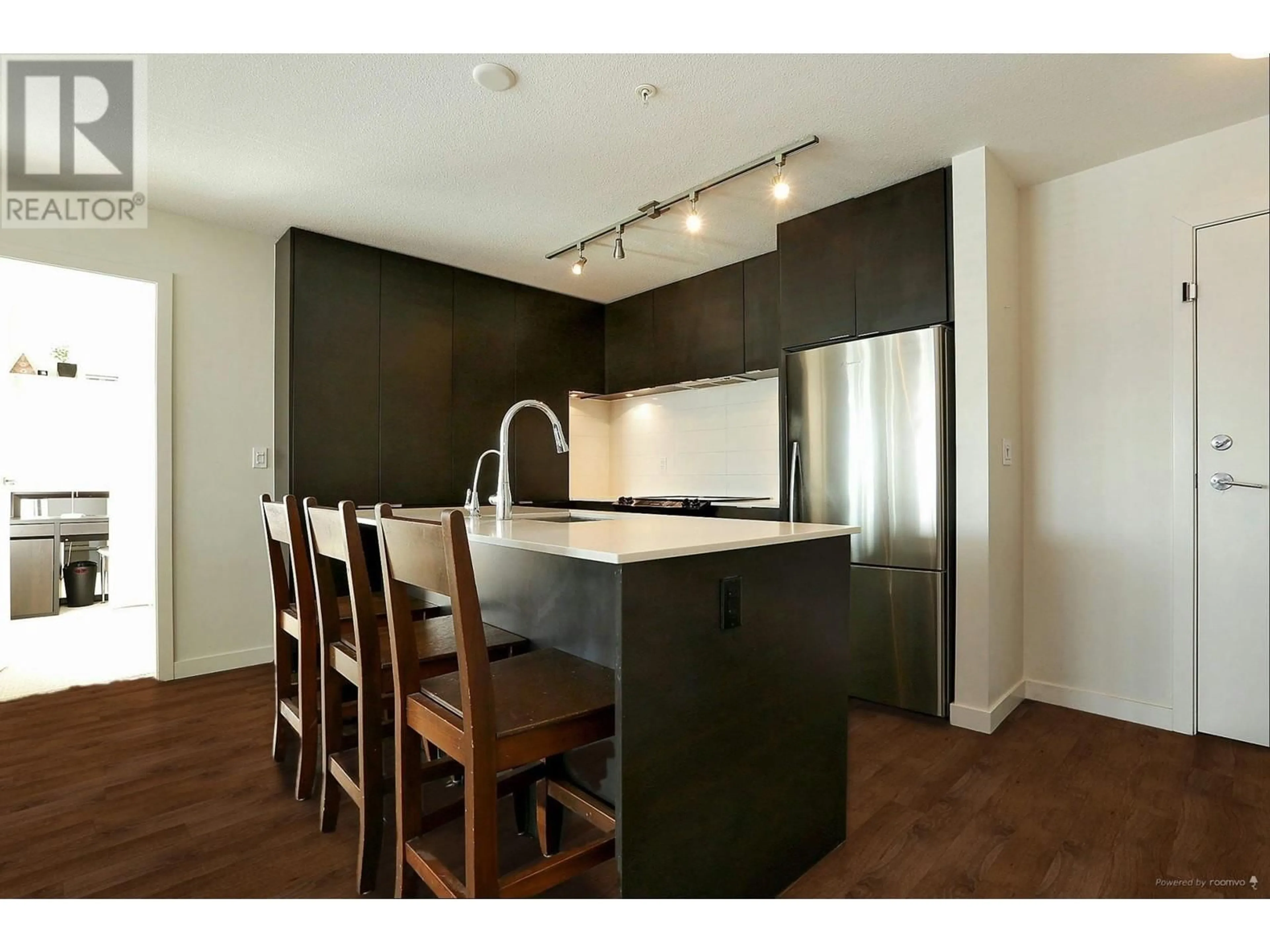 Open concept kitchen for 306 1673 LLOYD AVENUE, North Vancouver British Columbia V7P0A9