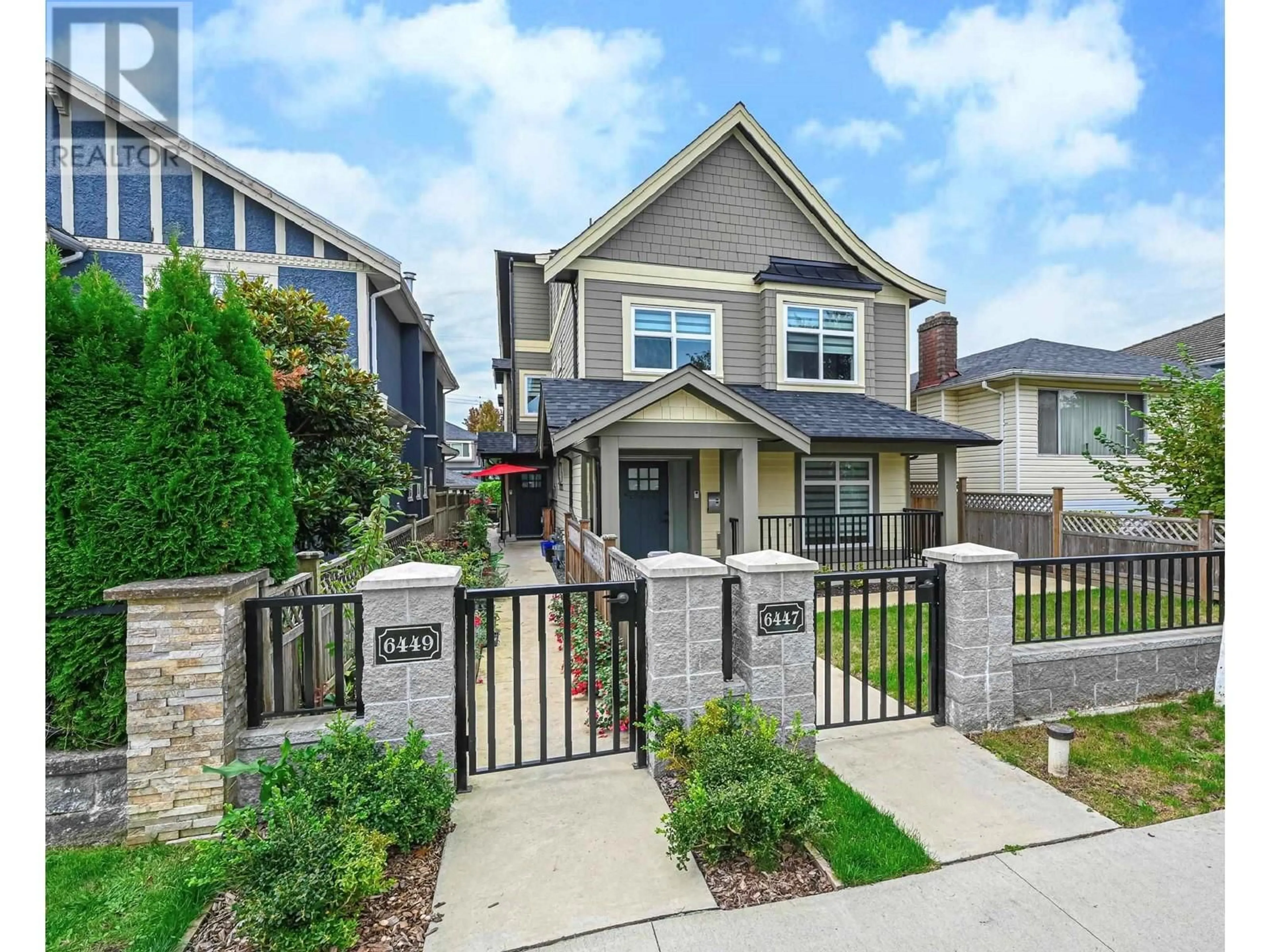 Frontside or backside of a home, the fenced backyard for 6447 BEATRICE STREET, Vancouver British Columbia V5P3R5