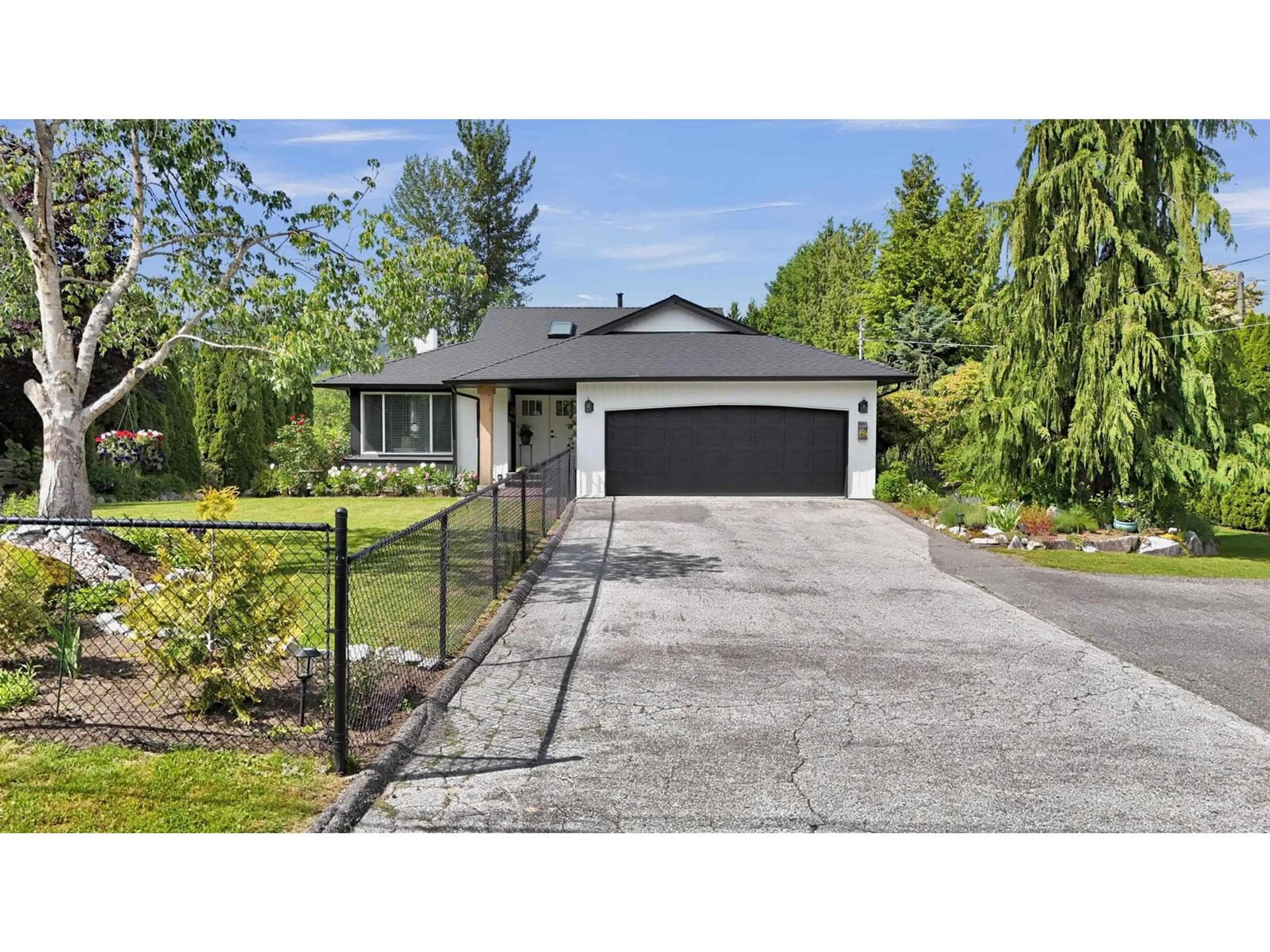 Frontside or backside of a home, the fenced backyard for 34085 YORK AVENUE, Mission British Columbia V2V6Y5