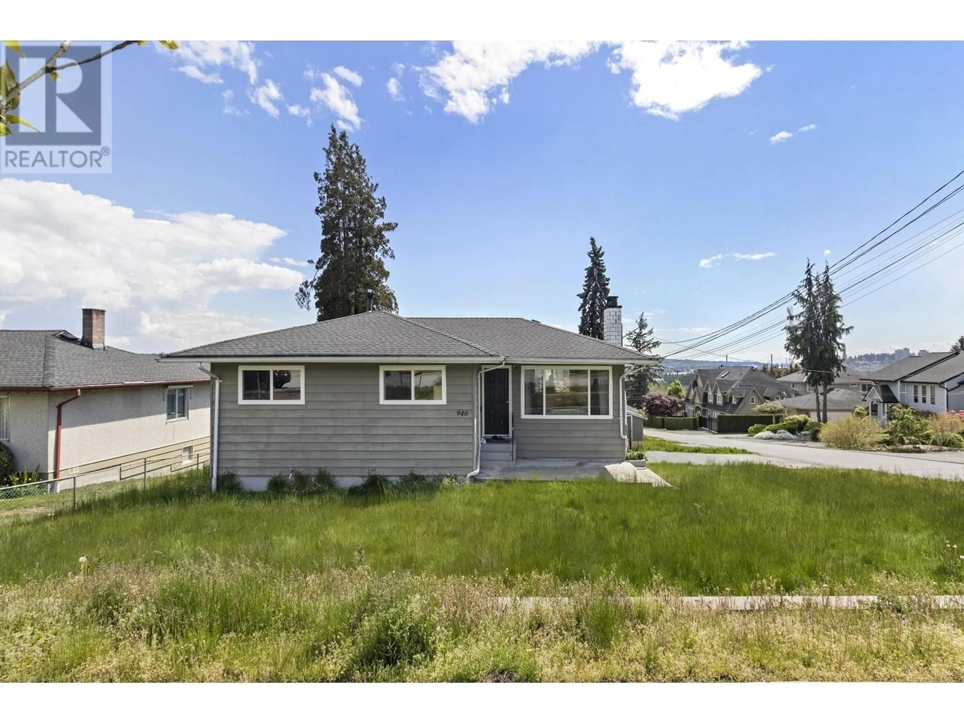 Frontside or backside of a home, the fenced backyard for 946 QUADLING AVENUE, Coquitlam British Columbia V3K2A7