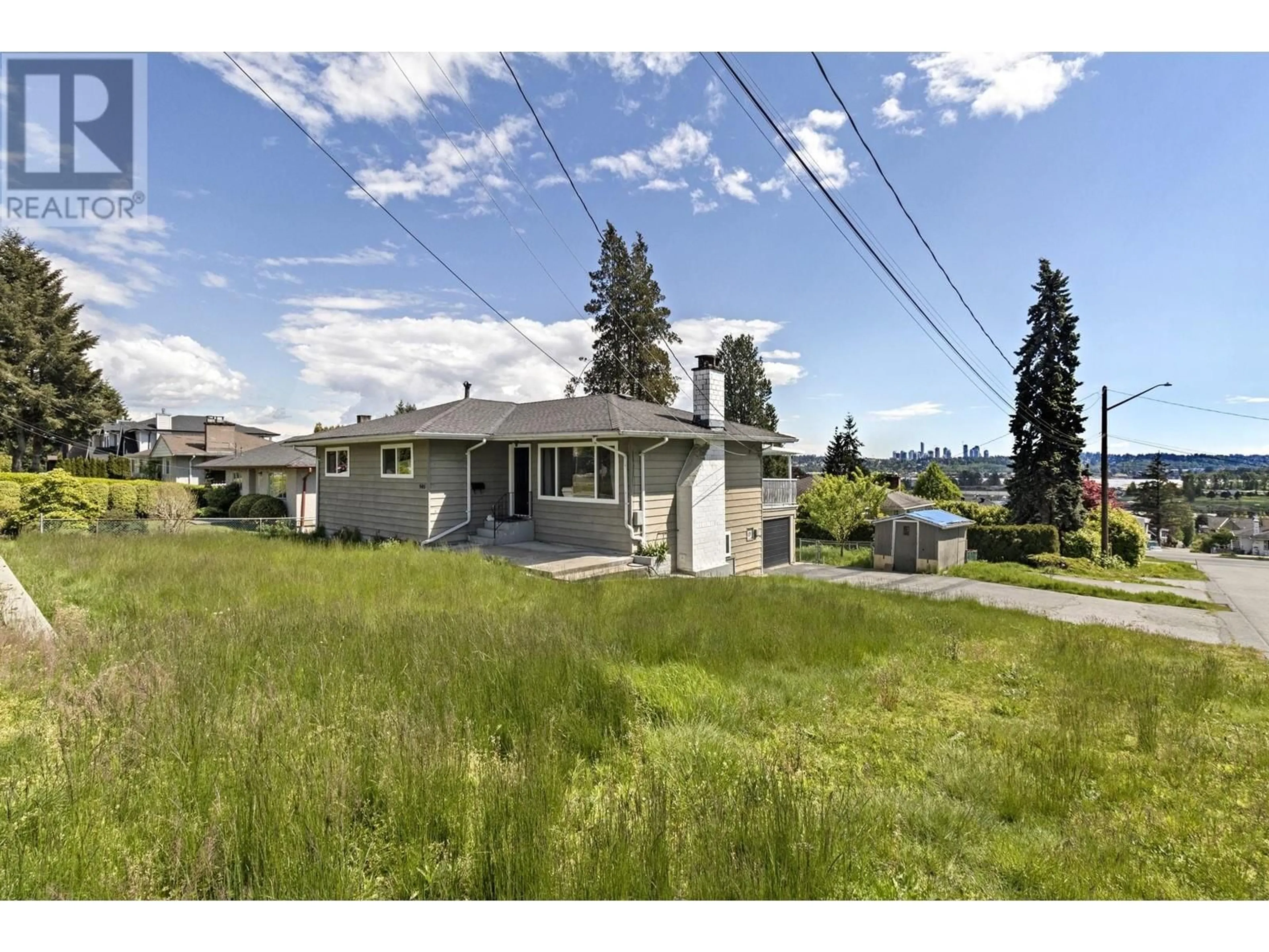 Frontside or backside of a home, the fenced backyard for 946 QUADLING AVENUE, Coquitlam British Columbia V3K2A7