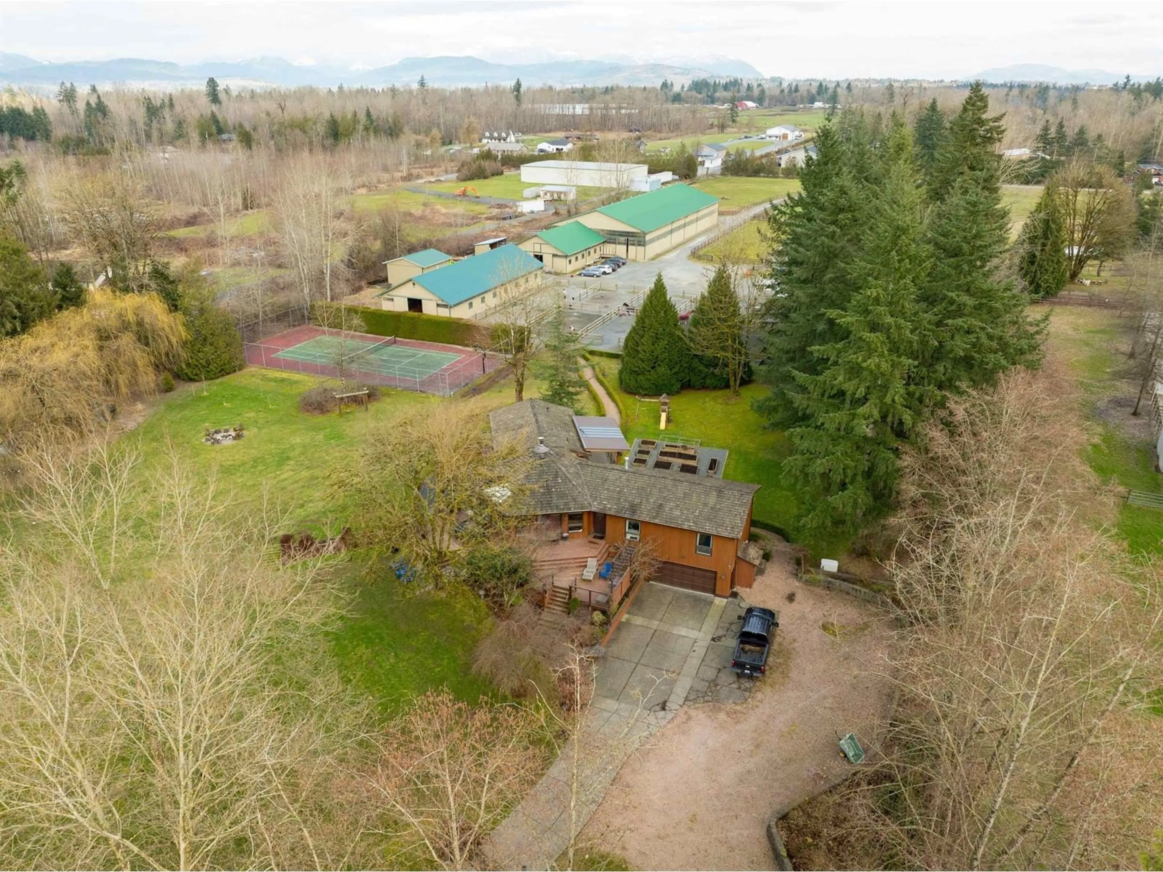 Frontside or backside of a home, the fenced backyard for 7278 256 STREET, Langley British Columbia V4W1V2