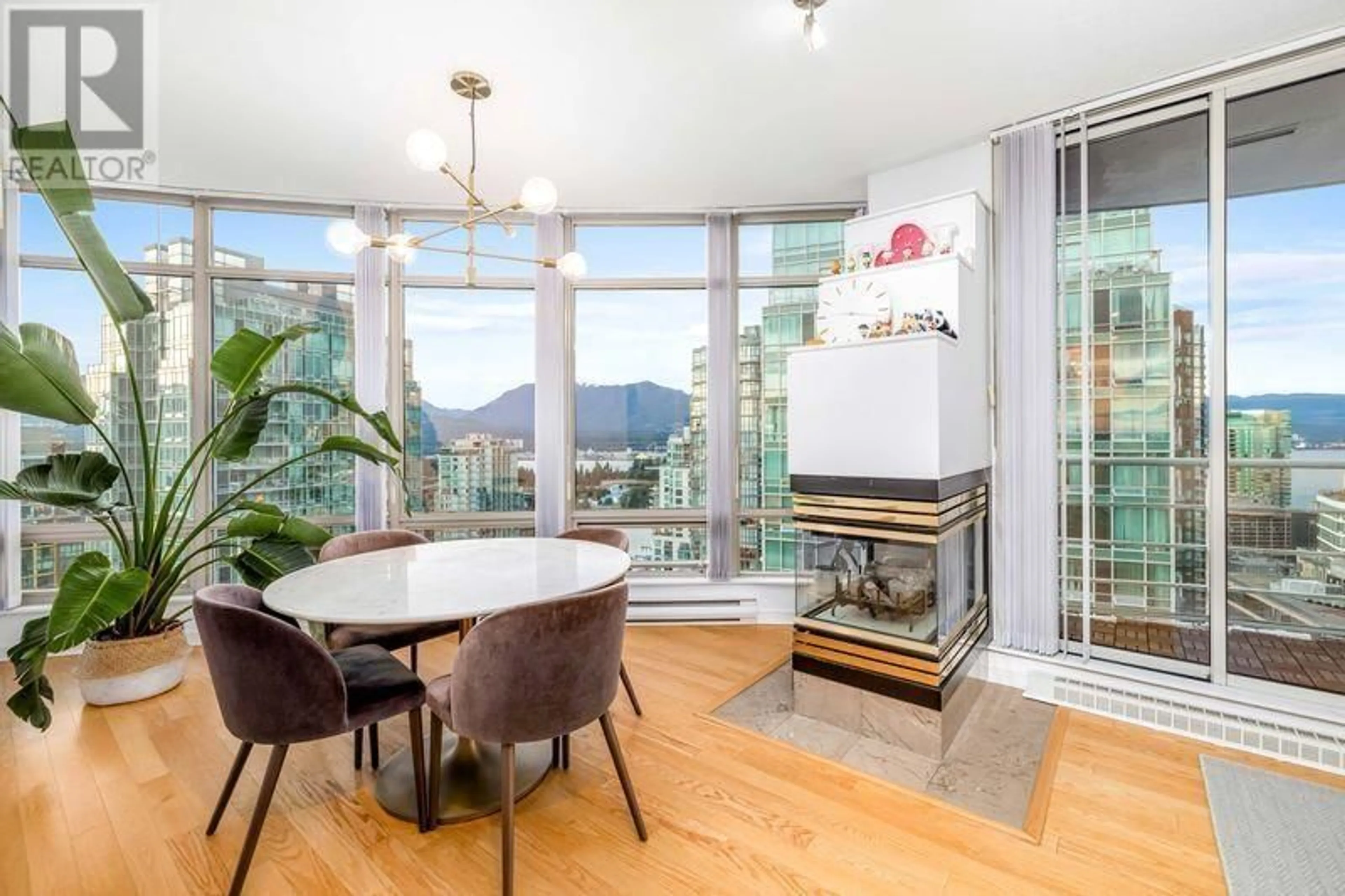 Dining room, wood floors, the view of mountain for 2903 1200 ALBERNI STREET, Vancouver British Columbia V6E1A6