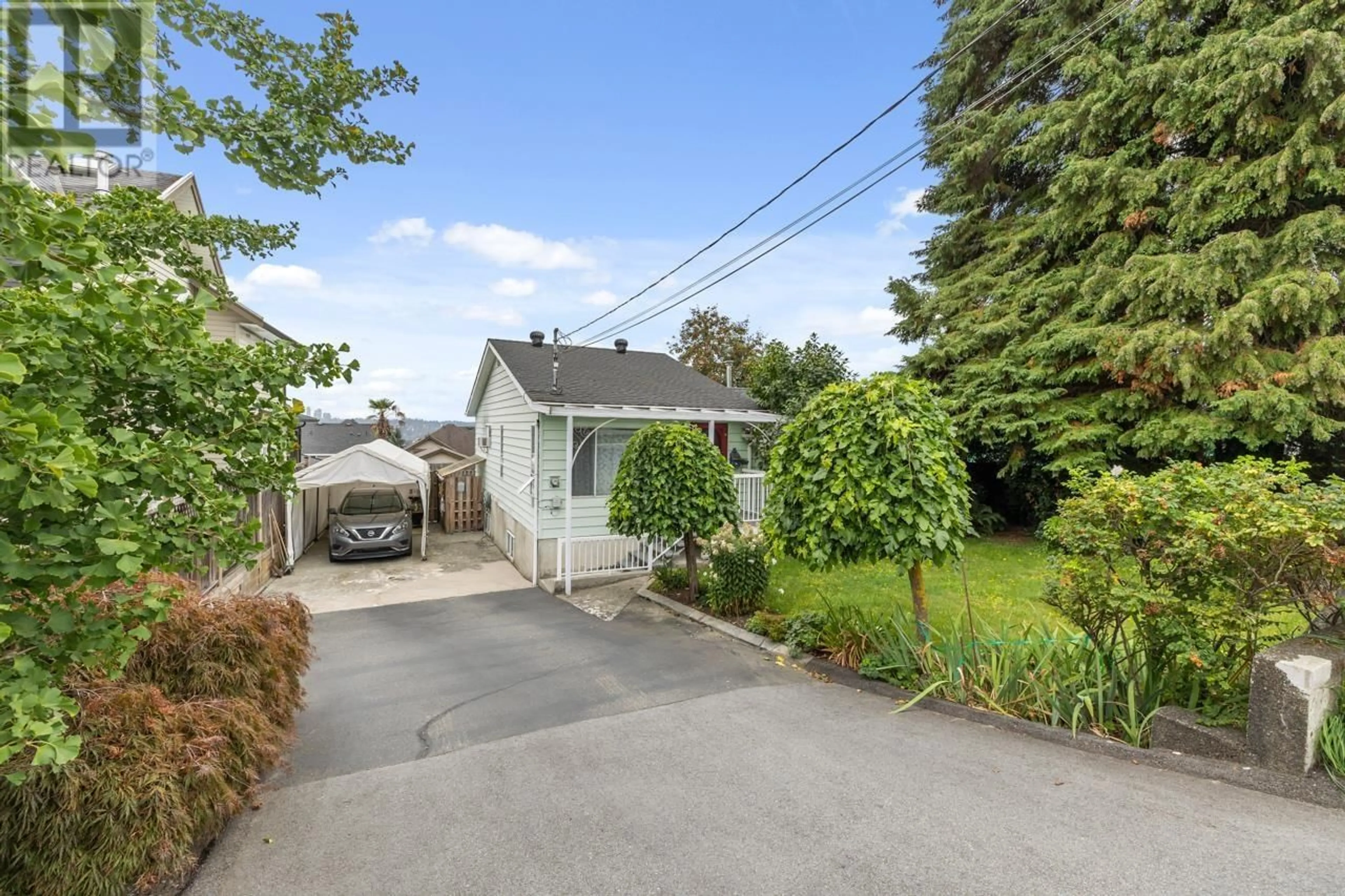 Frontside or backside of a home, the fenced backyard for 1020 WALLS AVENUE, Coquitlam British Columbia V3K2T6