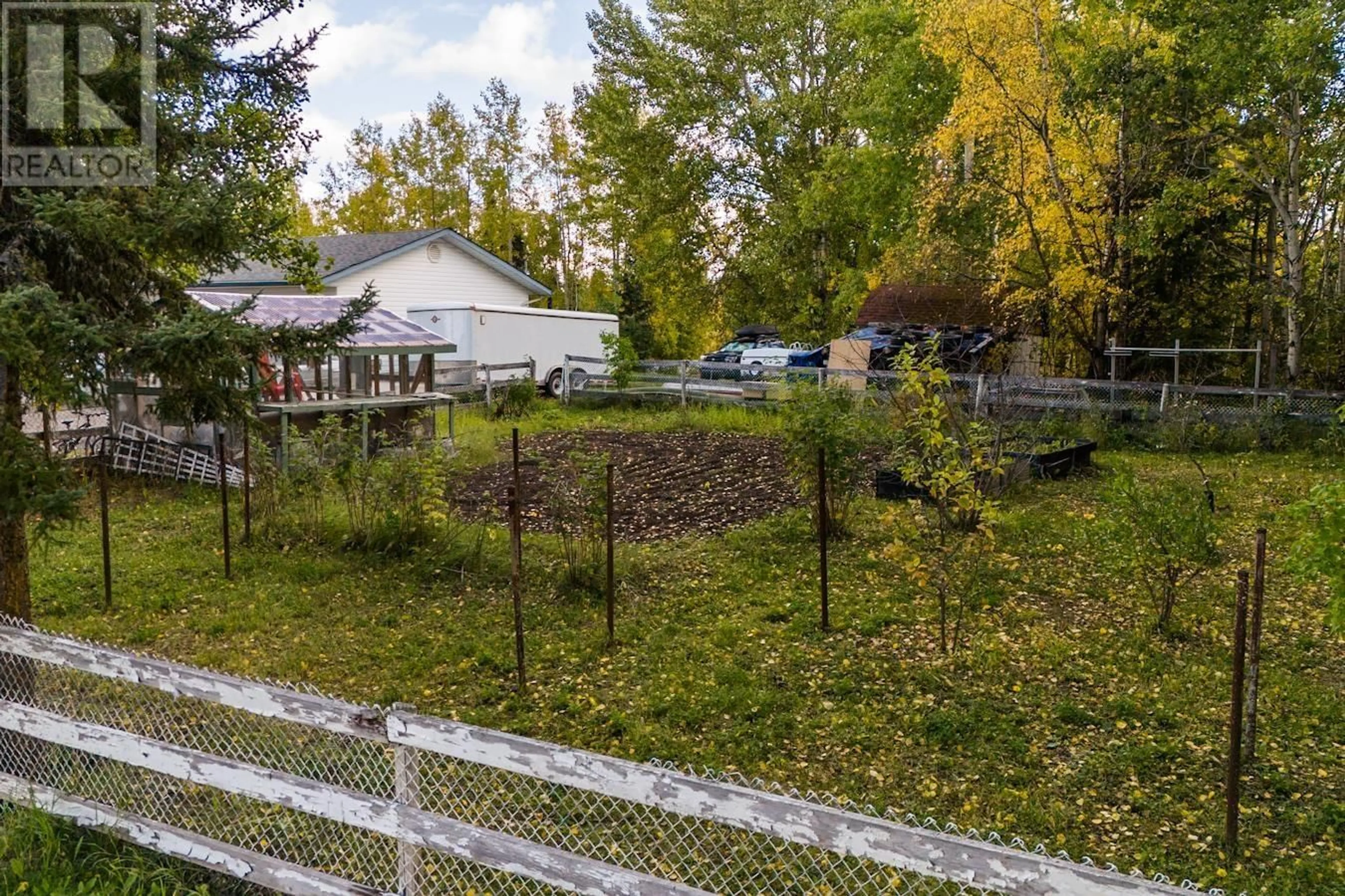 Patio, the fenced backyard for 12330 TOWER ROAD, Prince George British Columbia V2N5C2