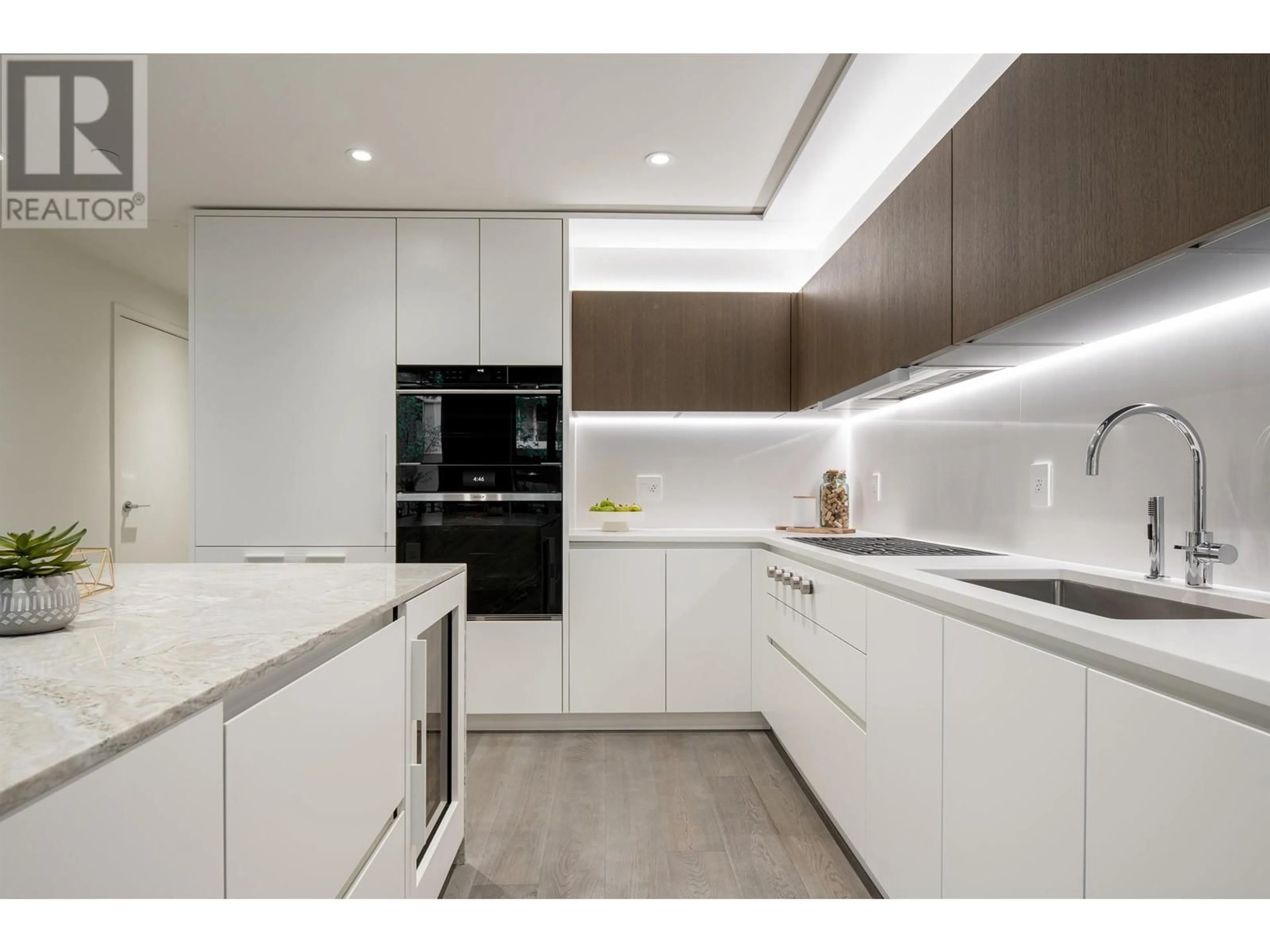 Contemporary kitchen, wood floors for 3593 W 29TH AVENUE, Vancouver British Columbia V6S2G5